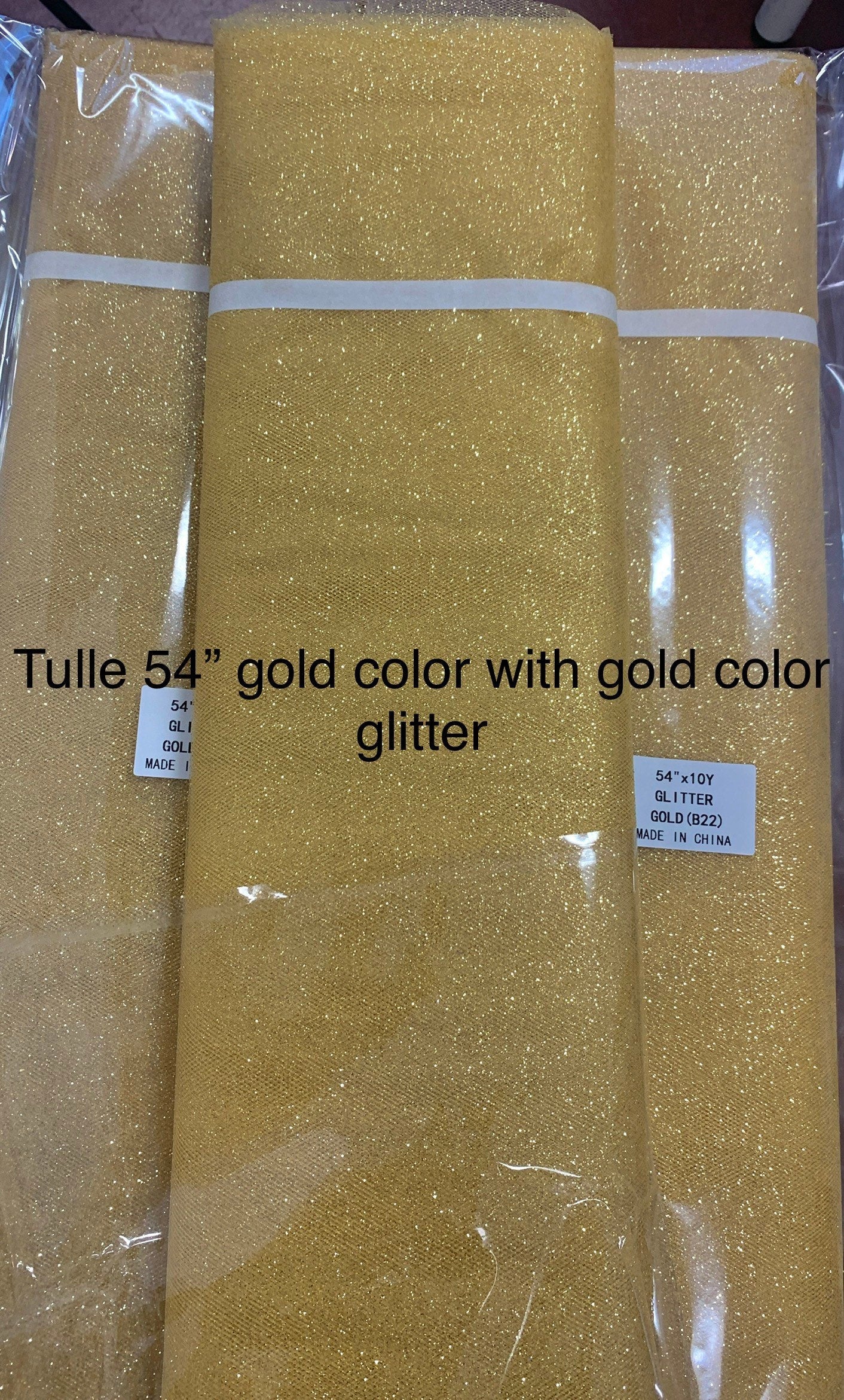 Gold color Glitter Tulle 10 yards 54" double fold, color gold with gold glitter. 10 yards.