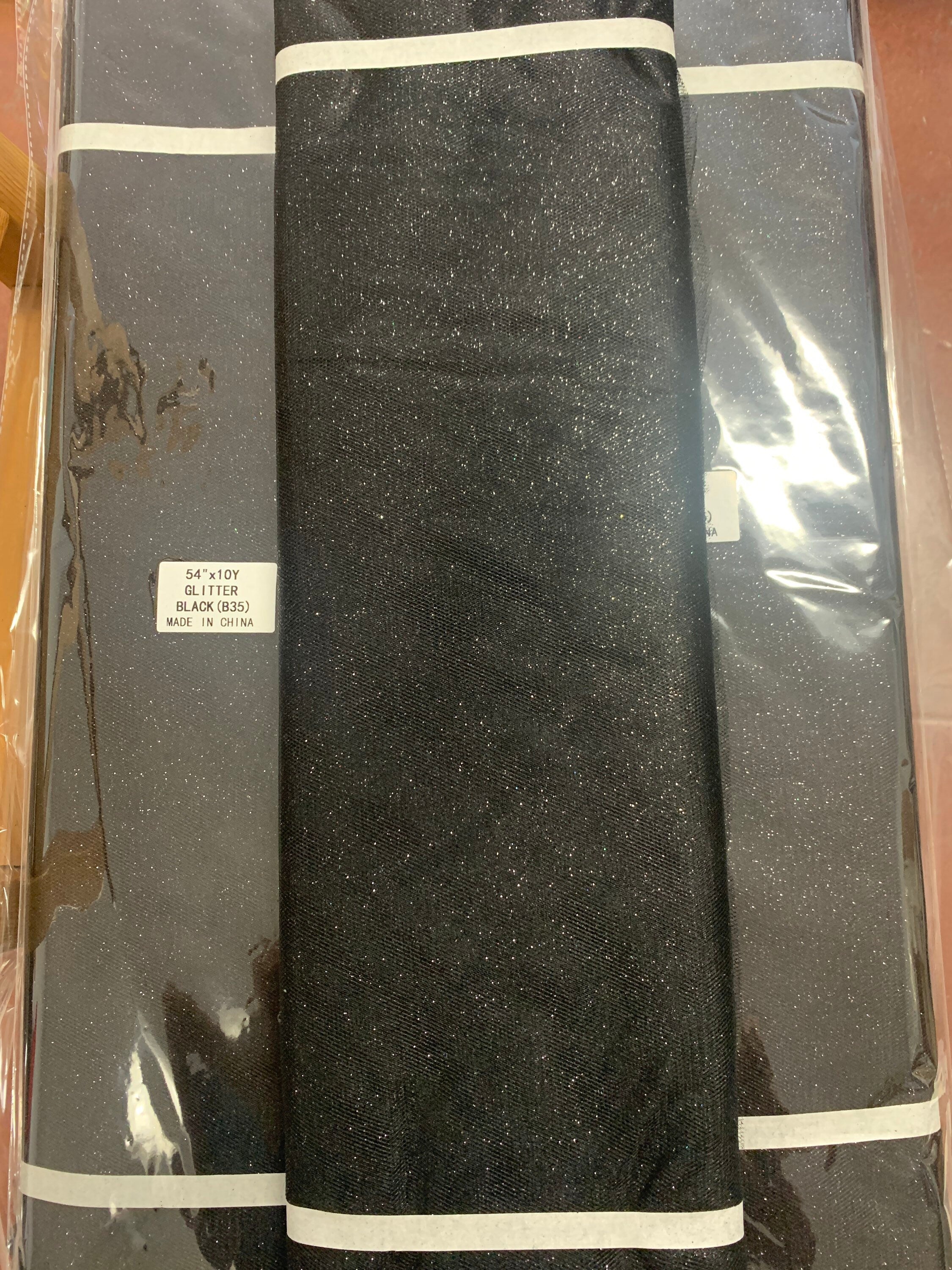 Black Glitter Tulle 54" double fold, color Black with Silver glitter 10 yards per pack.
