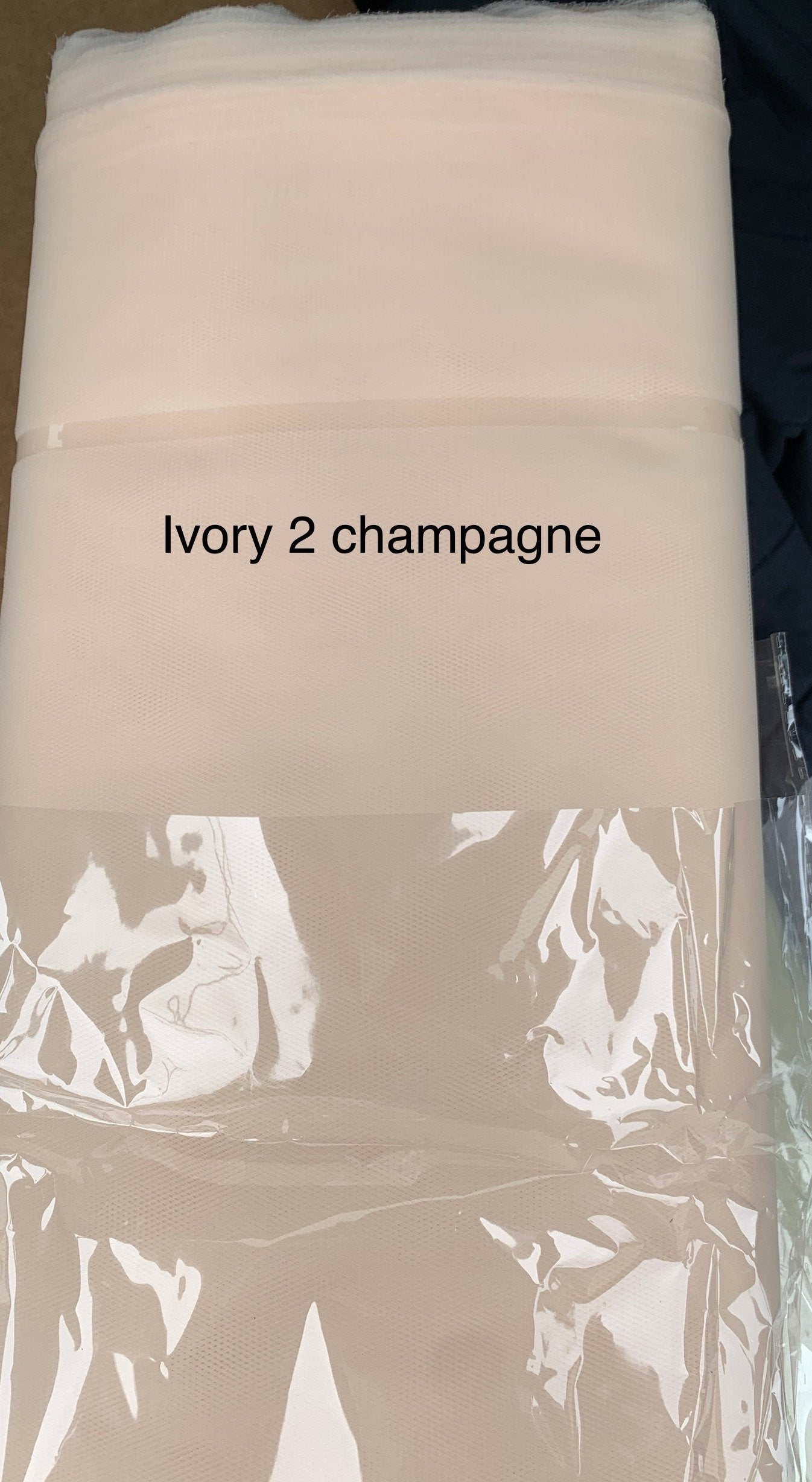 Ivory 2 and champagne tulle 54", 40 yards bolt, width 54" double fold.