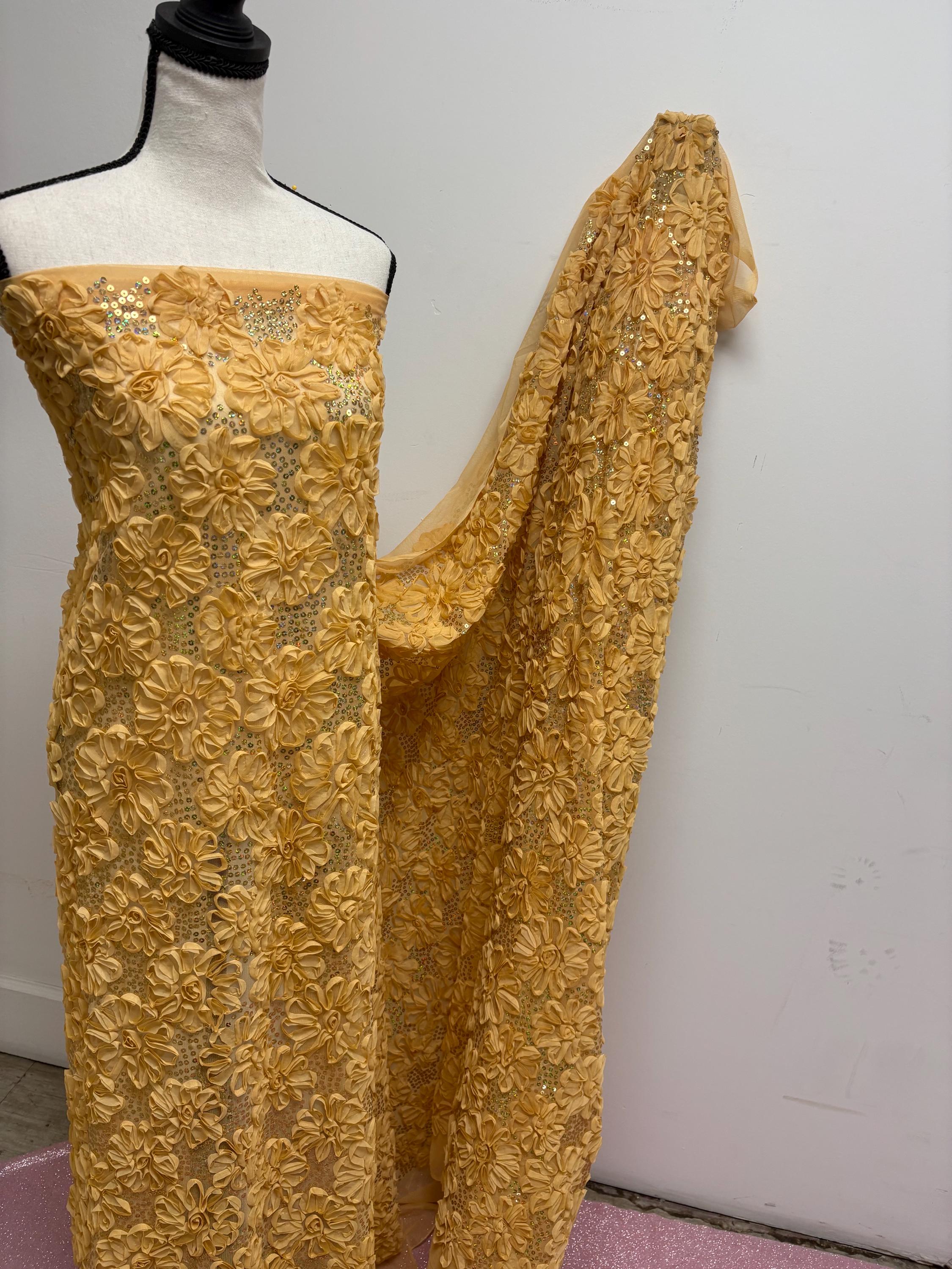 Chiffon ribbon mesh fabric color gold with sequence. sells by yard.