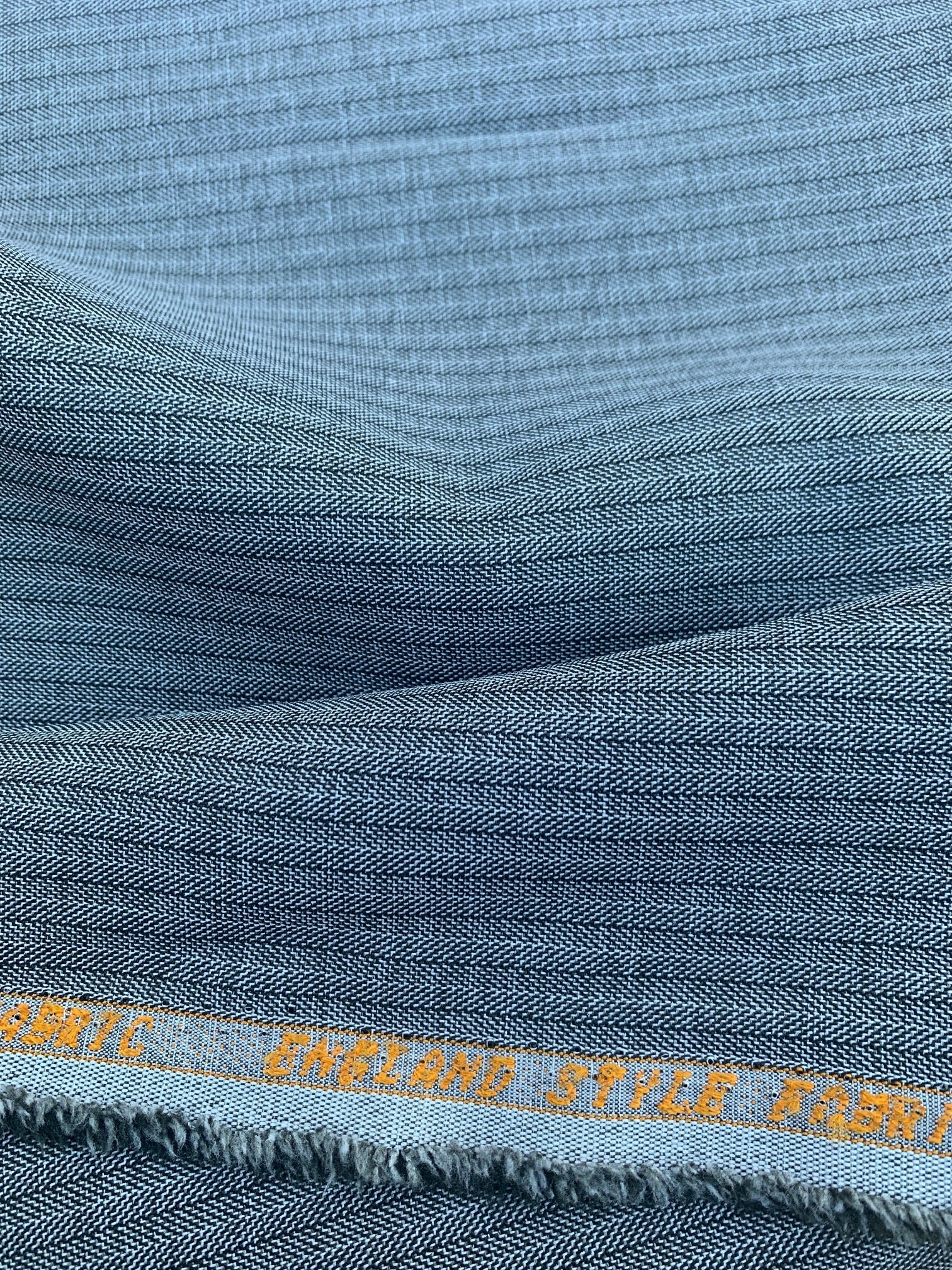 Suiting Fabric sell by yard, color stripe gray, common use in skirt, jacket, uniform and pants. Free sample available.