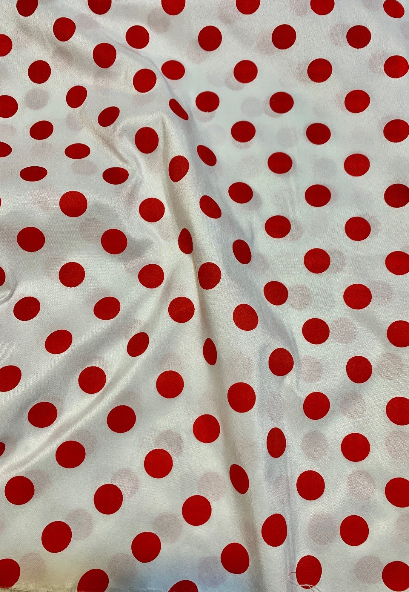 A 2 yards Red Polk dot fabric. dot size is 3/4 inches in diameter. Sold by 2 yards cut continuous.