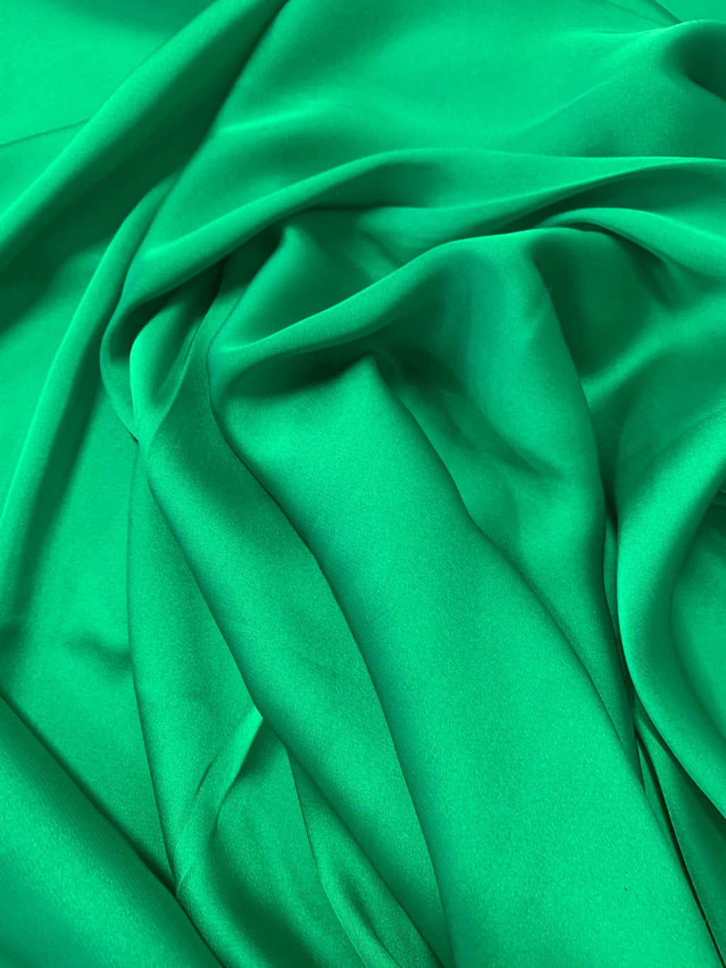 Silky dull soft satin fabric, color Emerald width 59/60 inches 100% polyester. use for blouse, dress and light weight garment and sheer.