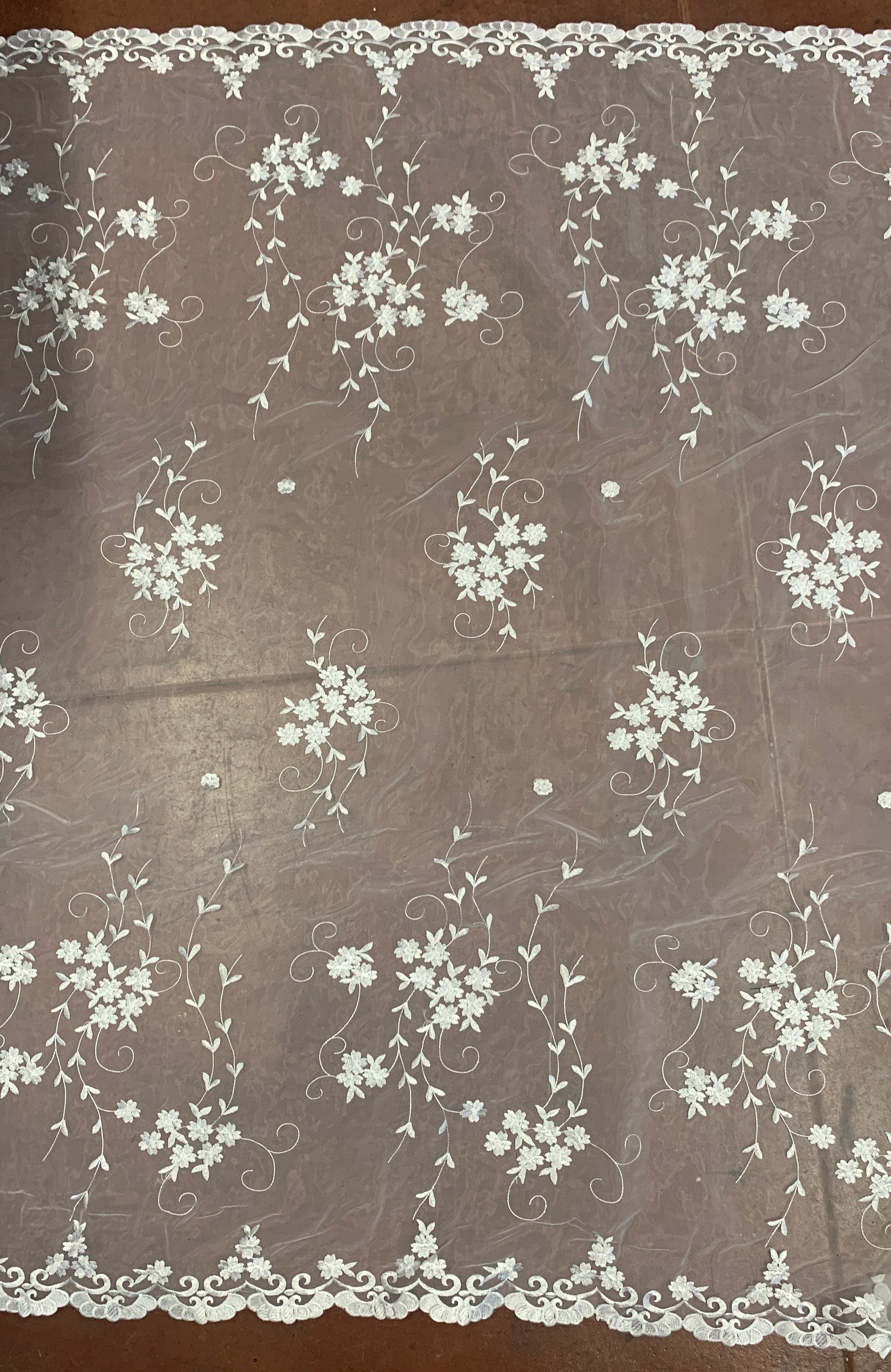 Organza Embroidery double scalloped color is combination of white/silver/ gray width 53/54" 100% polyester sell by yard