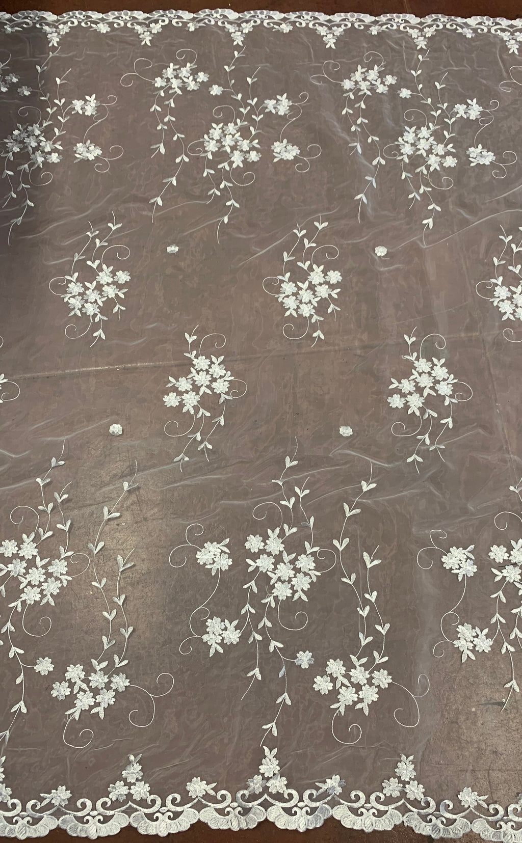 Organza Embroidery double scalloped color is combination of white/silver/ gray width 53/54" 100% polyester sell by yard