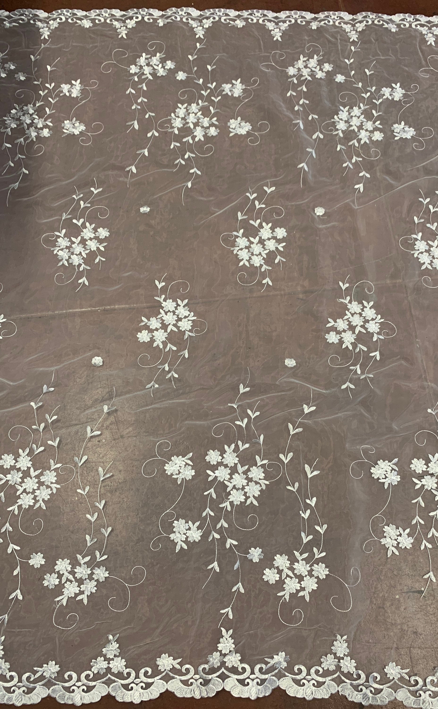 Organza Embroidery double scalloped color is combination of white/silver/ gray width 53/54" 100% polyester sell by yard