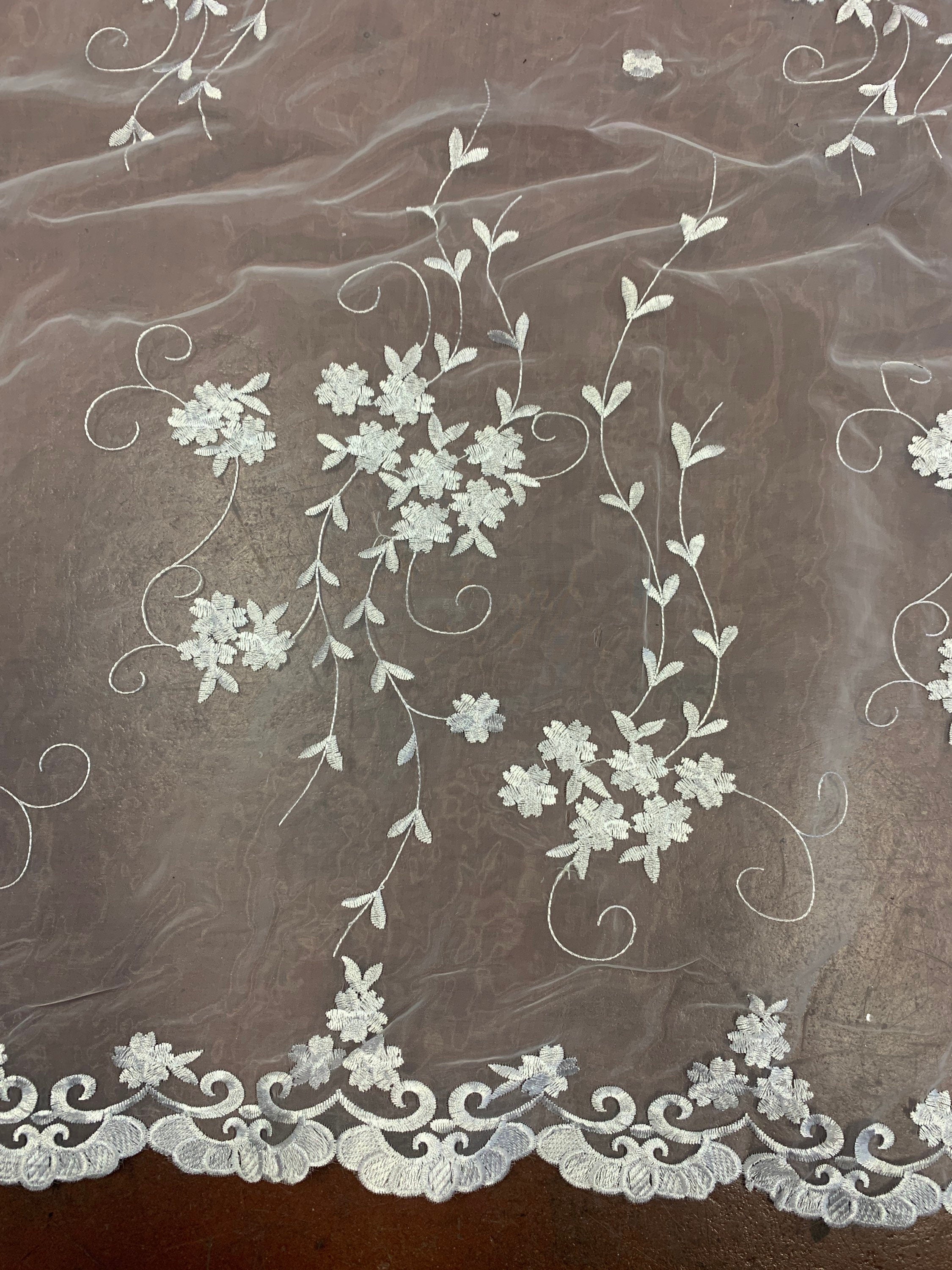 Organza Embroidery double scalloped color is combination of white/silver/ gray width 53/54" 100% polyester sell by yard