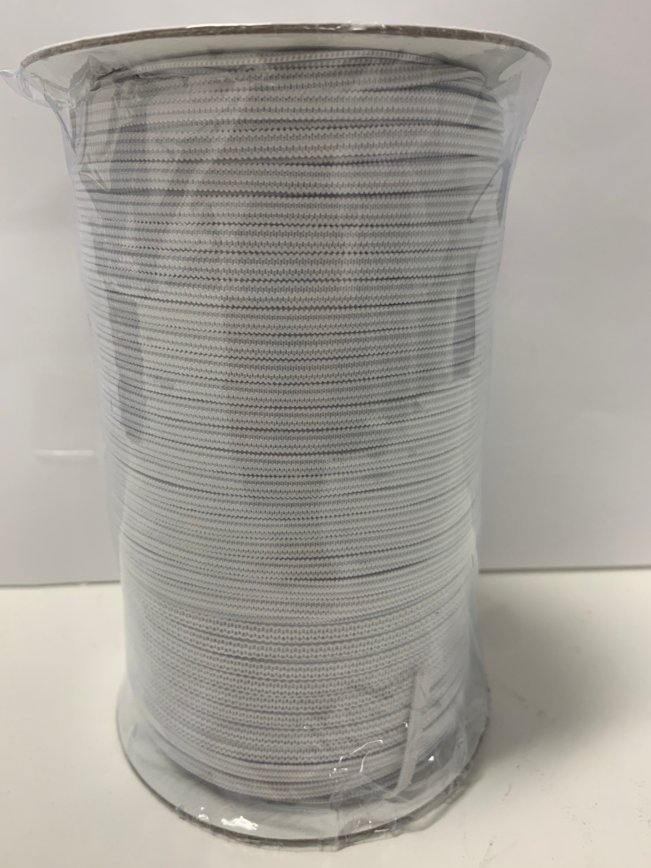 White Elastic color white width 1/8 inch 300 yards per spool, Draw cord elastic..