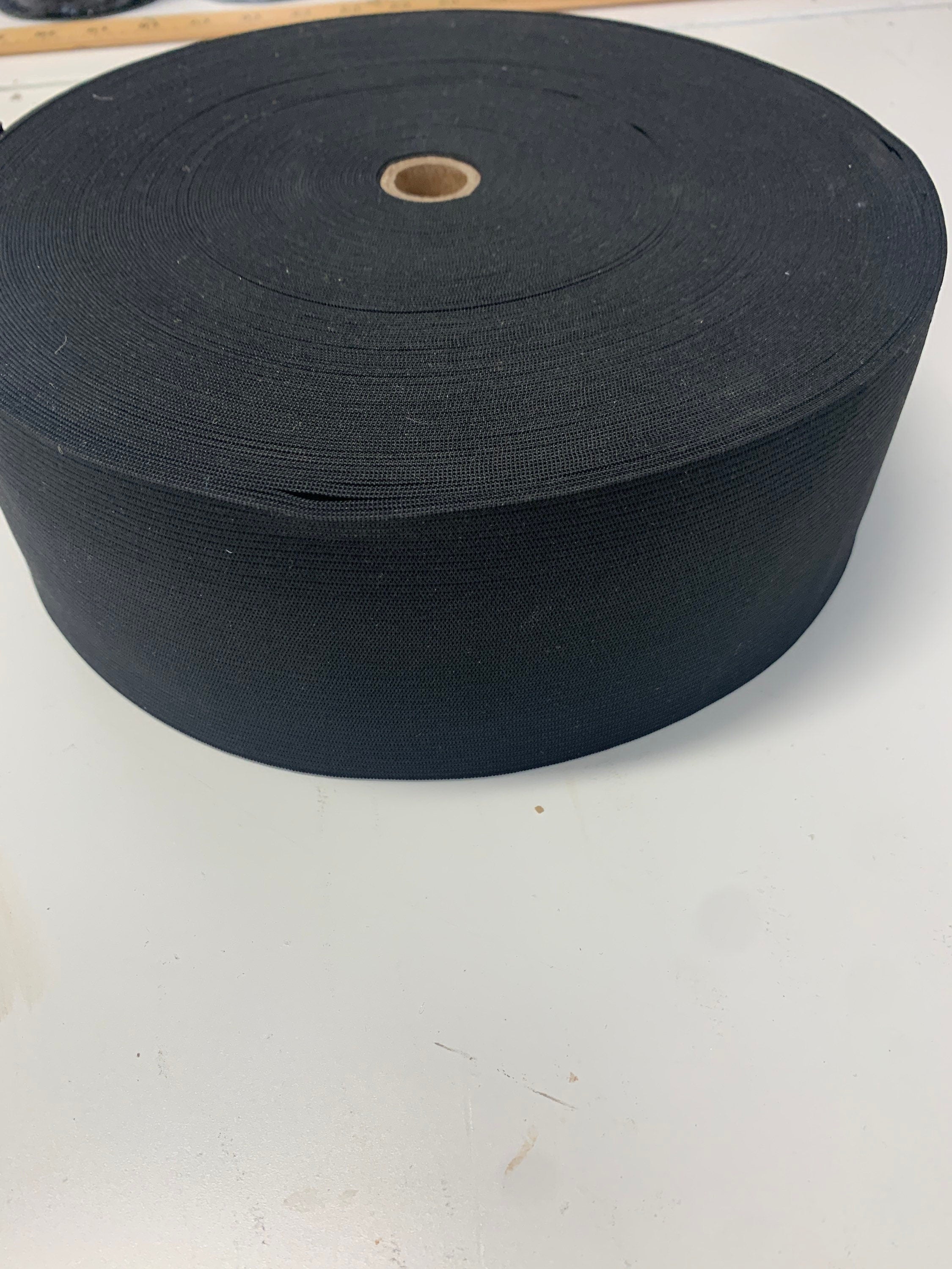 Elastic black 3 inches wide, 50 yards.