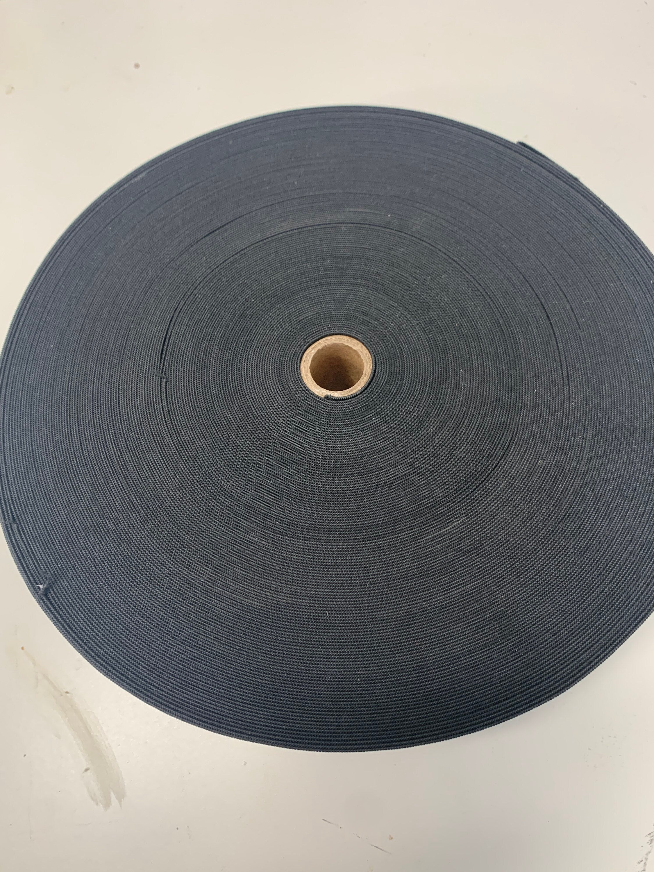 Elastic black 3 inches wide, 50 yards.