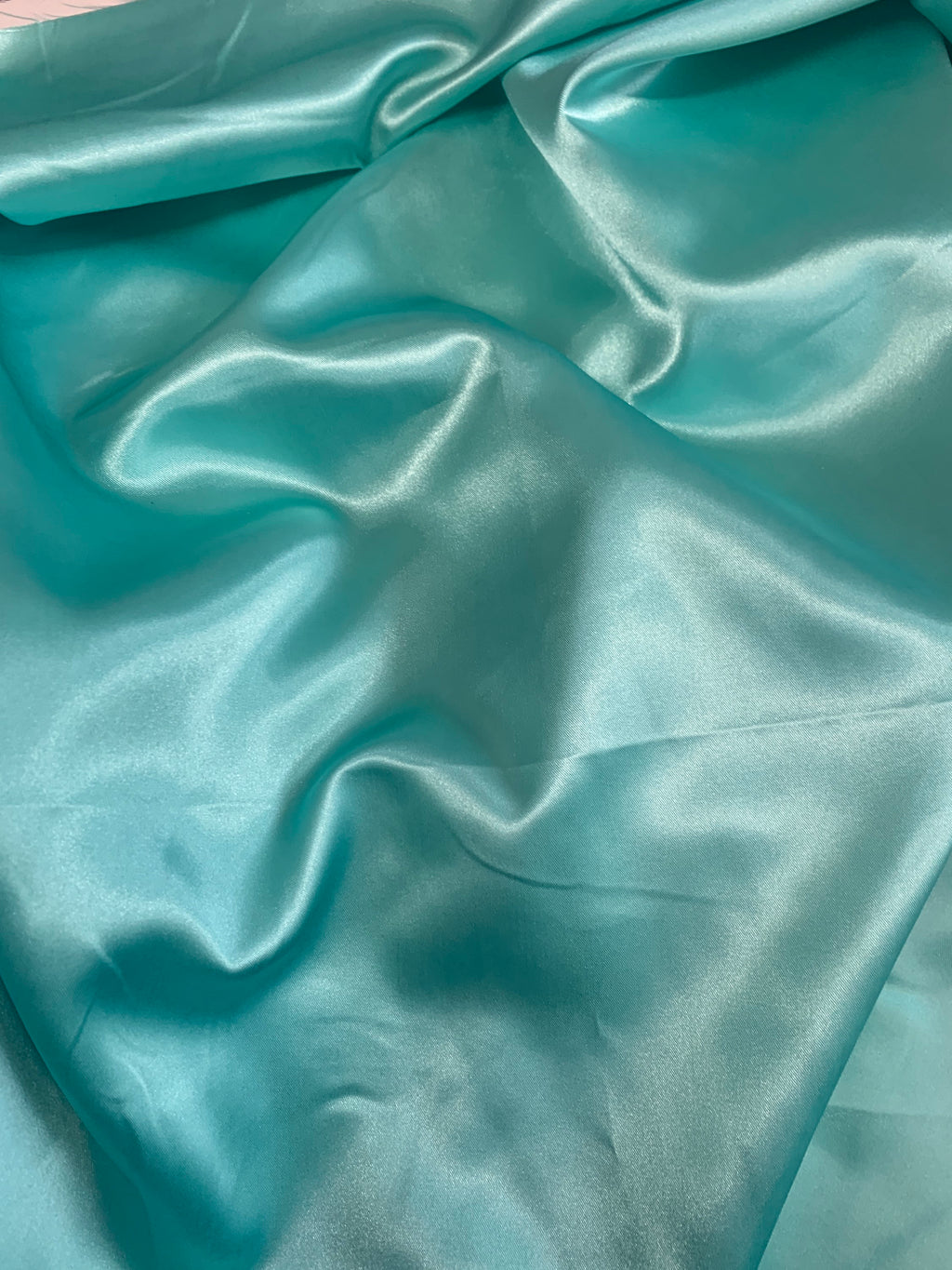Mint color Satin fabric. color Mint (item no 3142 medium satin)