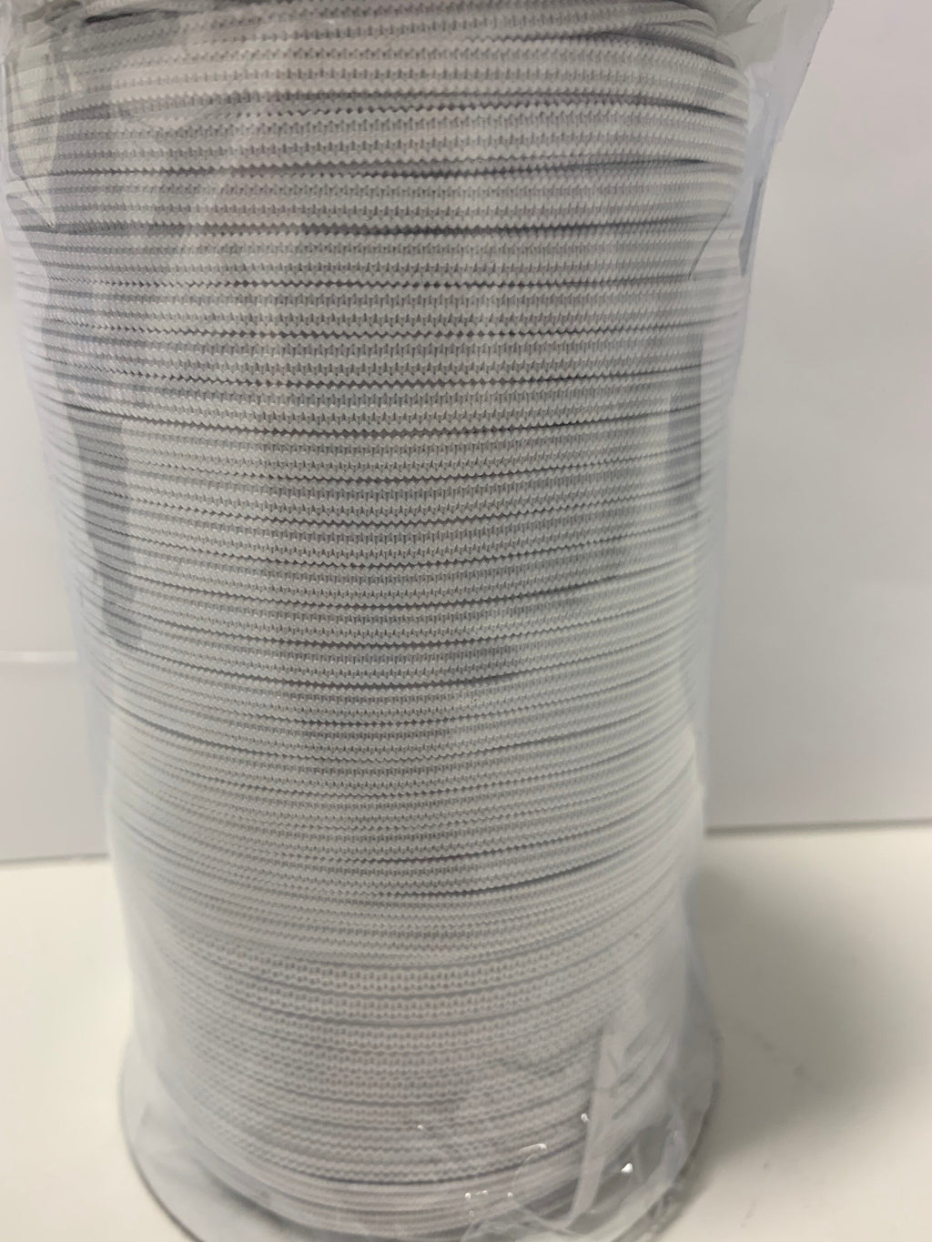 White Elastic color white width 1/8 inch 300 yards per spool, Draw cord elastic..