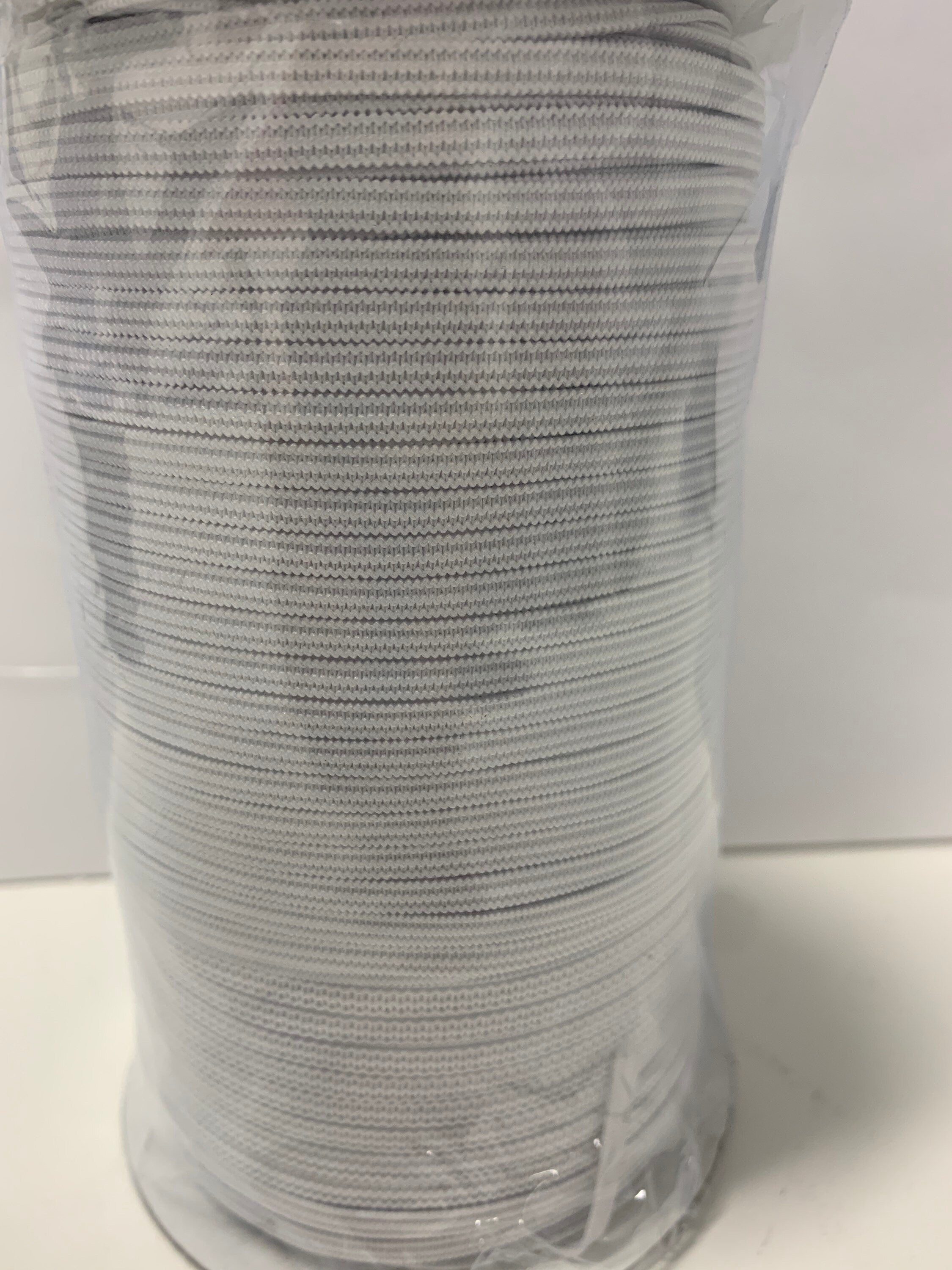 White Elastic color white width 1/8 inch 300 yards per spool, Draw cord elastic..