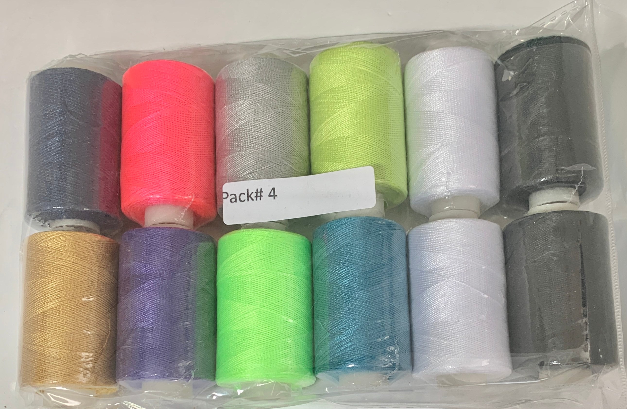 Sewing threads 12 assorted colors per package, each package assortment is different from each other, all packages has 2 black and 2 white.