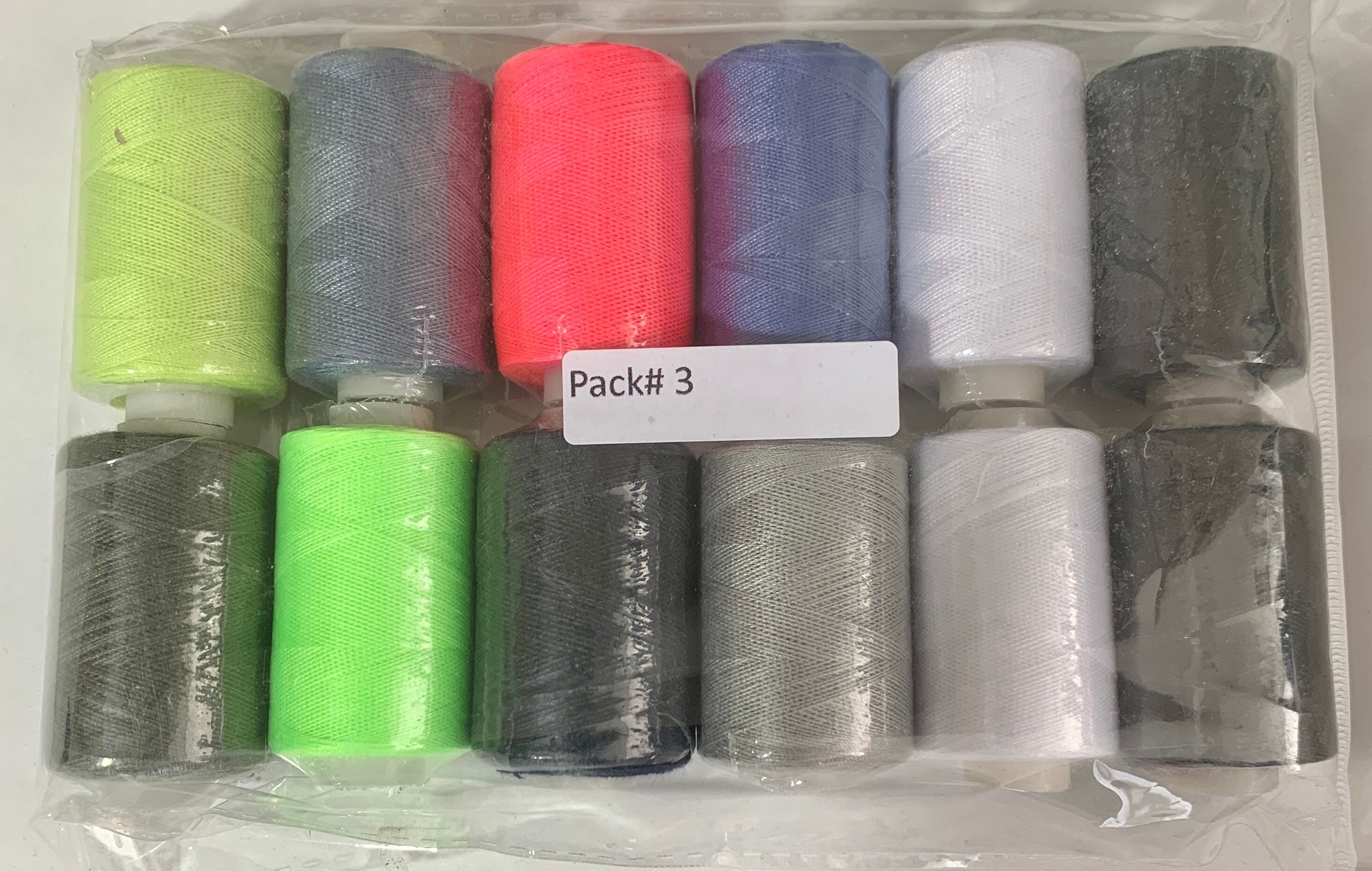 Sewing threads 12 assorted colors per package, each package assortment is different from each other, all packages has 2 black and 2 white.