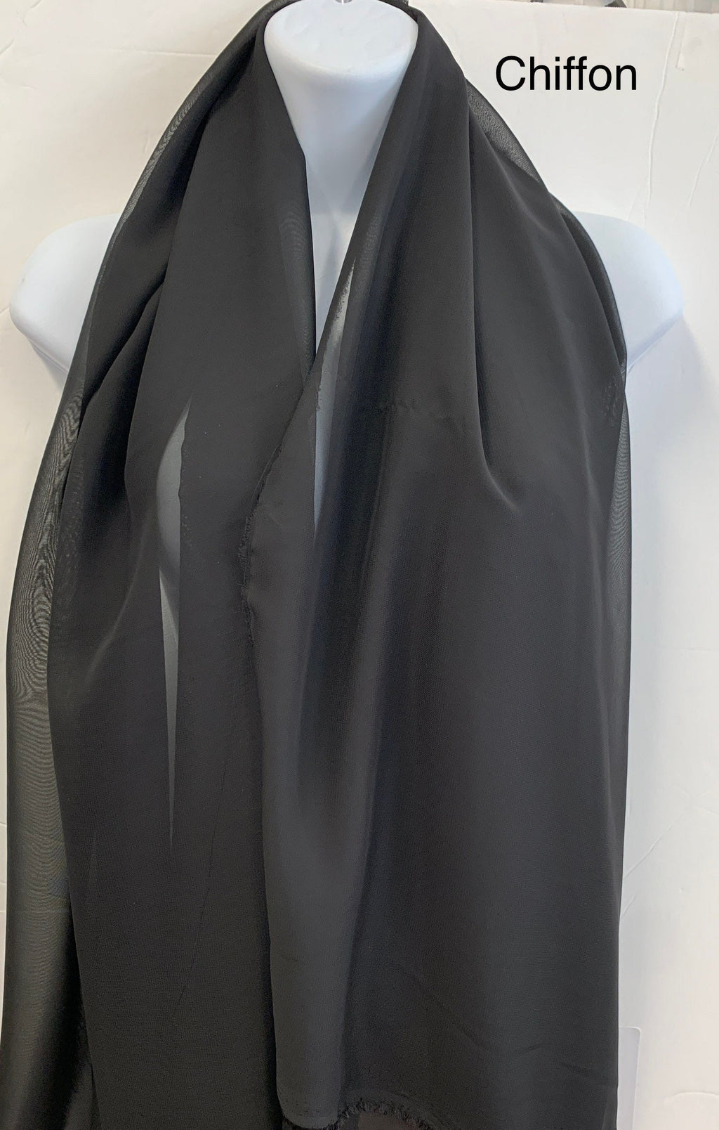 A 3 yard cut Black chiffon Fabric width 58/60". sell by increment of 3 yards continuous