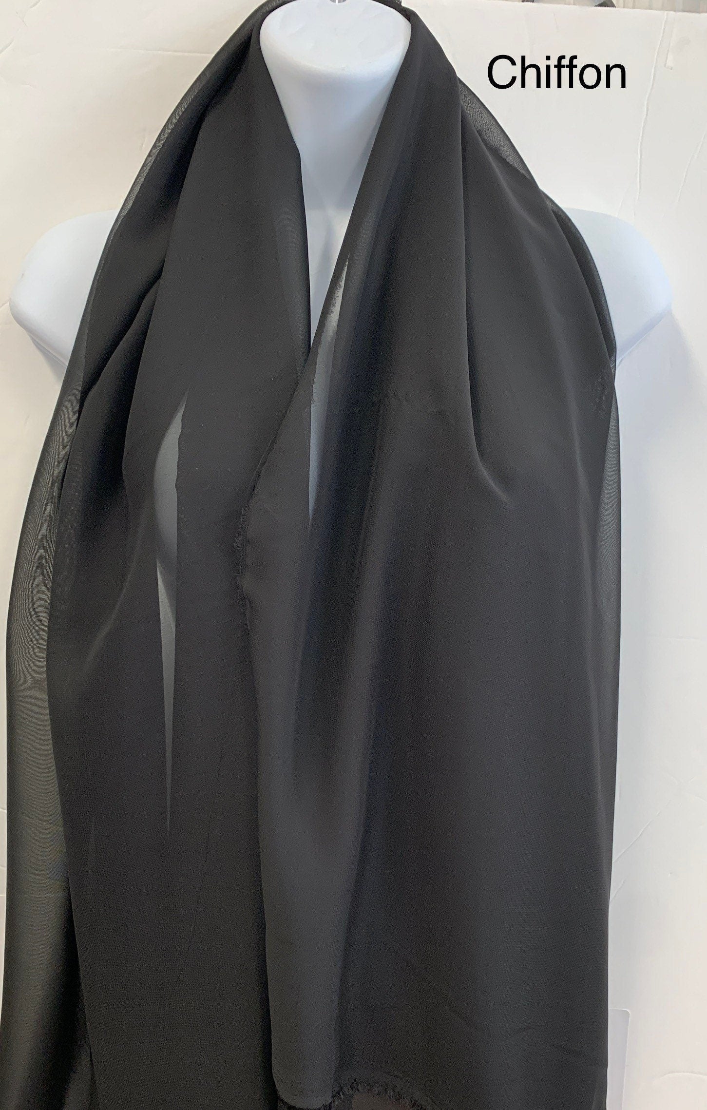 A 3 yard cut Black chiffon Fabric width 58/60". sell by increment of 3 yards continuous