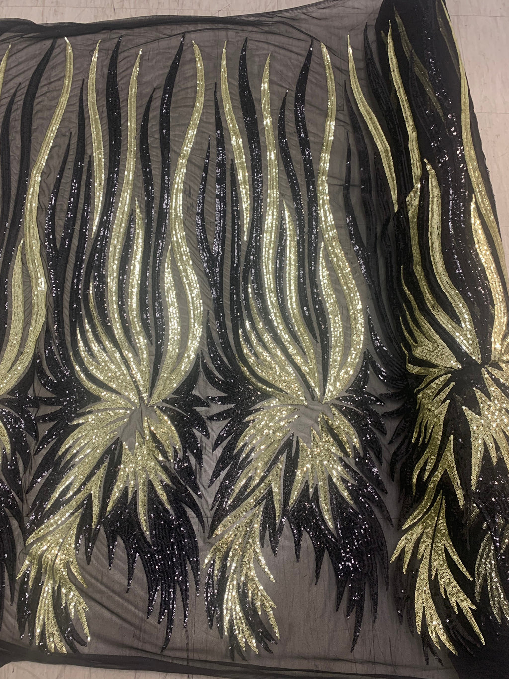 All over Sequins fabric design Princess color black/ Lt. gold, width 50 inches.
