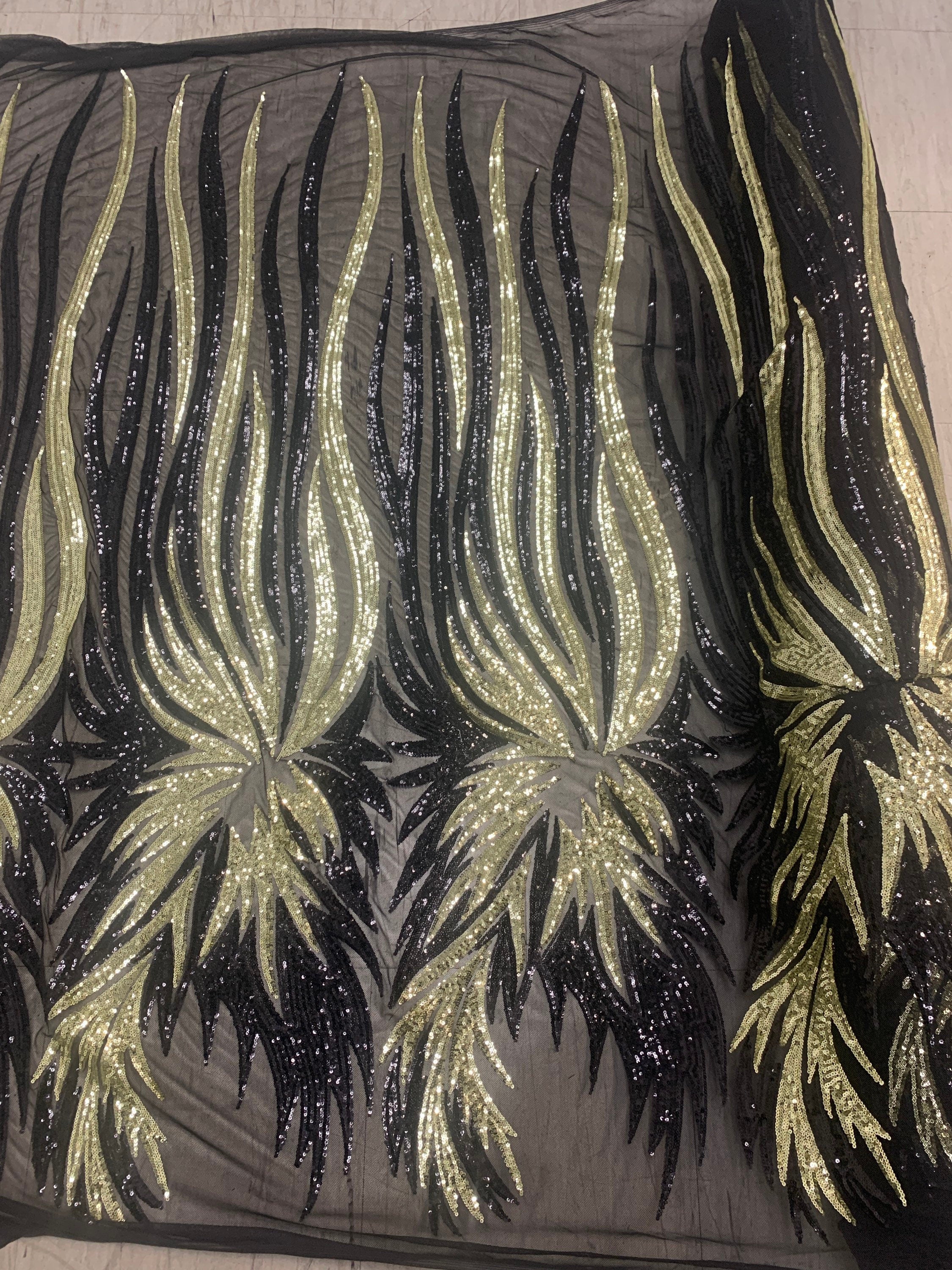 All over Sequins fabric design Princess color black/ Lt. gold, width 50 inches.