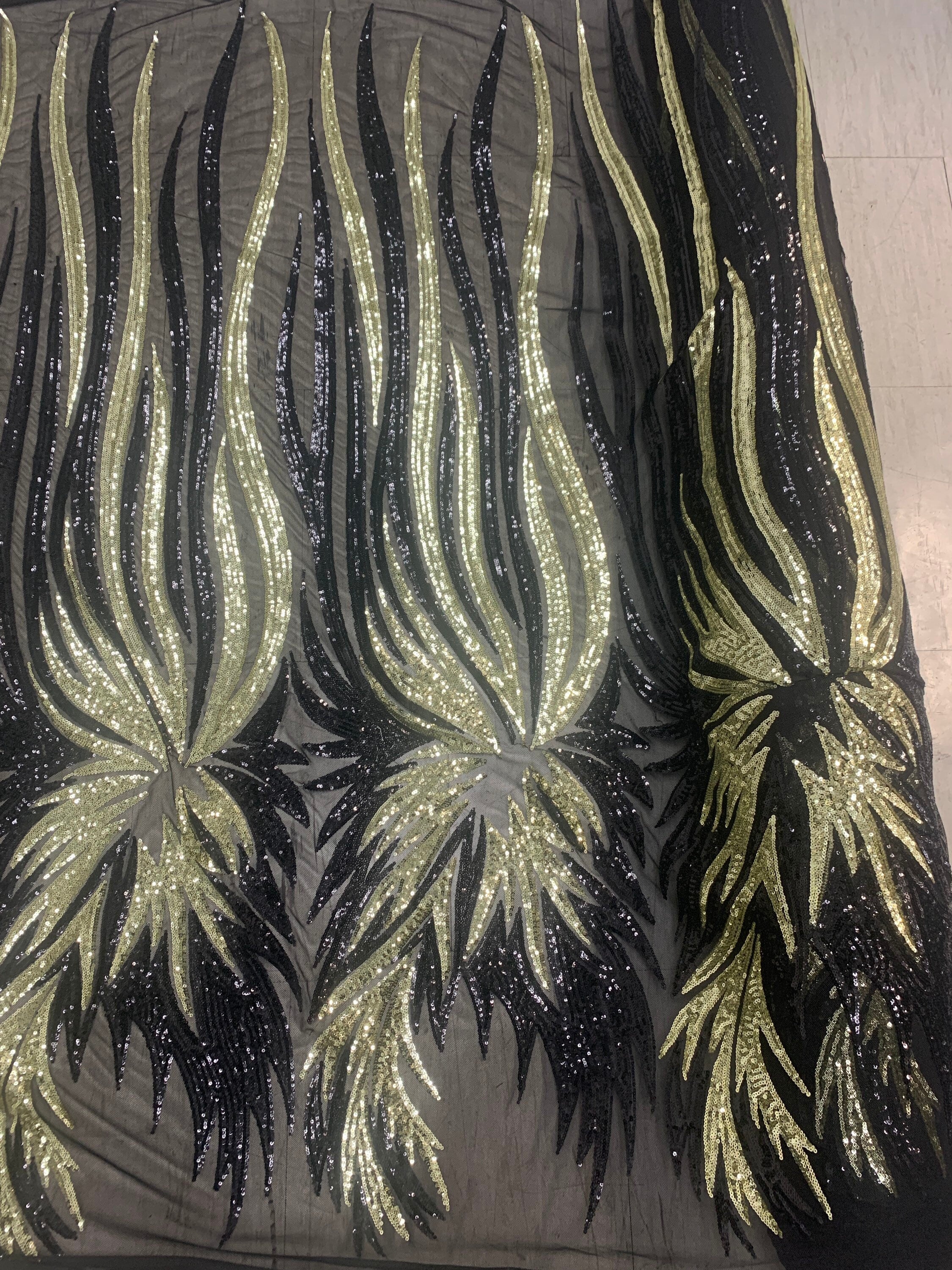 All over Sequins fabric design Princess color black/ Lt. gold, width 50 inches.
