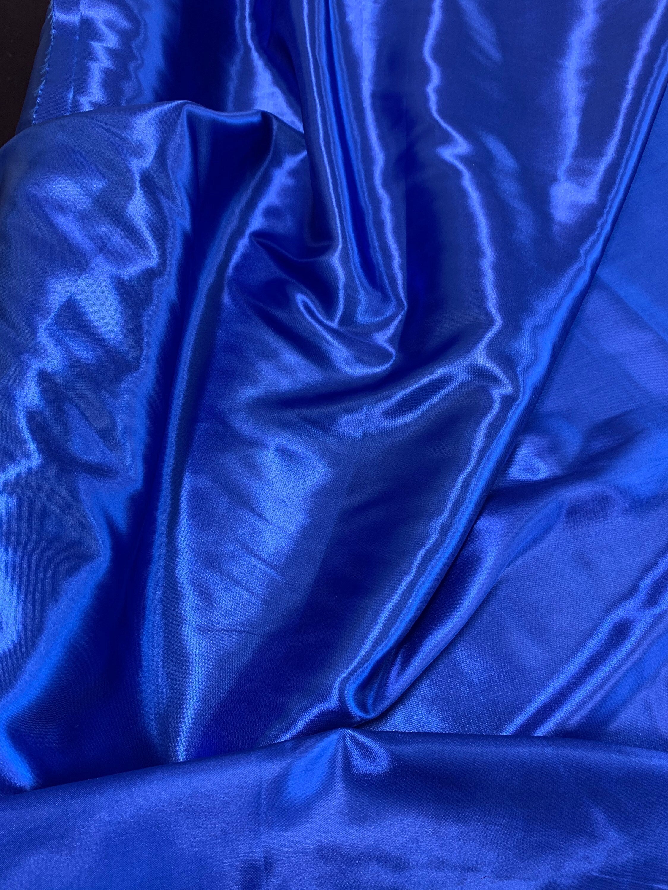 Royal and Purple Satin shiny sell by yard, Royal blue and purple width 59/60 inches. polyester fabric. sell by yard. known as soft satin.