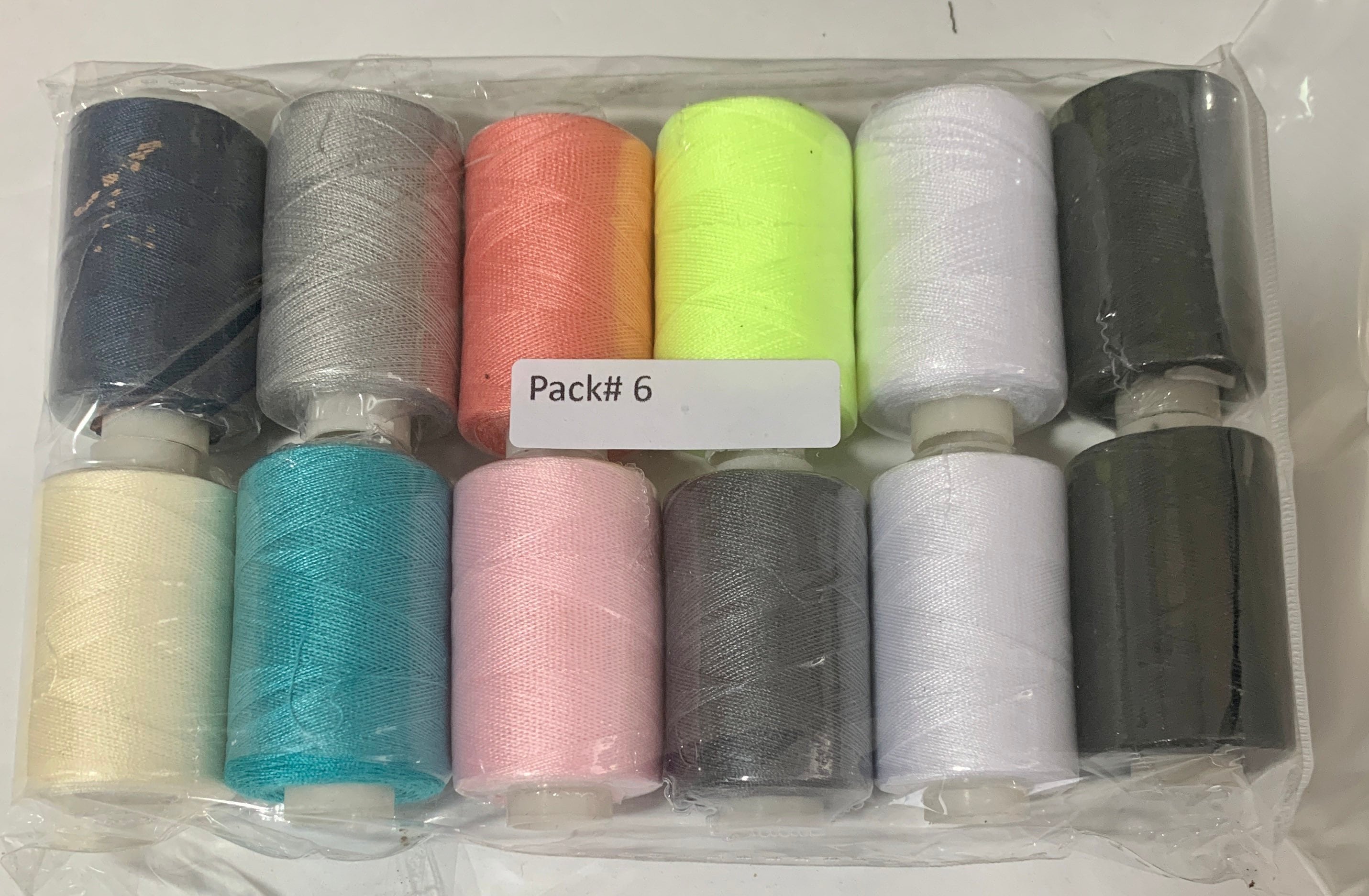Sewing threads 12 assorted colors per package, each package assortment is different from each other, all packages has 2 black and 2 white.