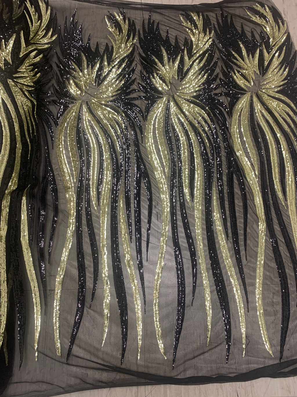 All over Sequins fabric design Princess color black/ Lt. gold, width 50 inches.