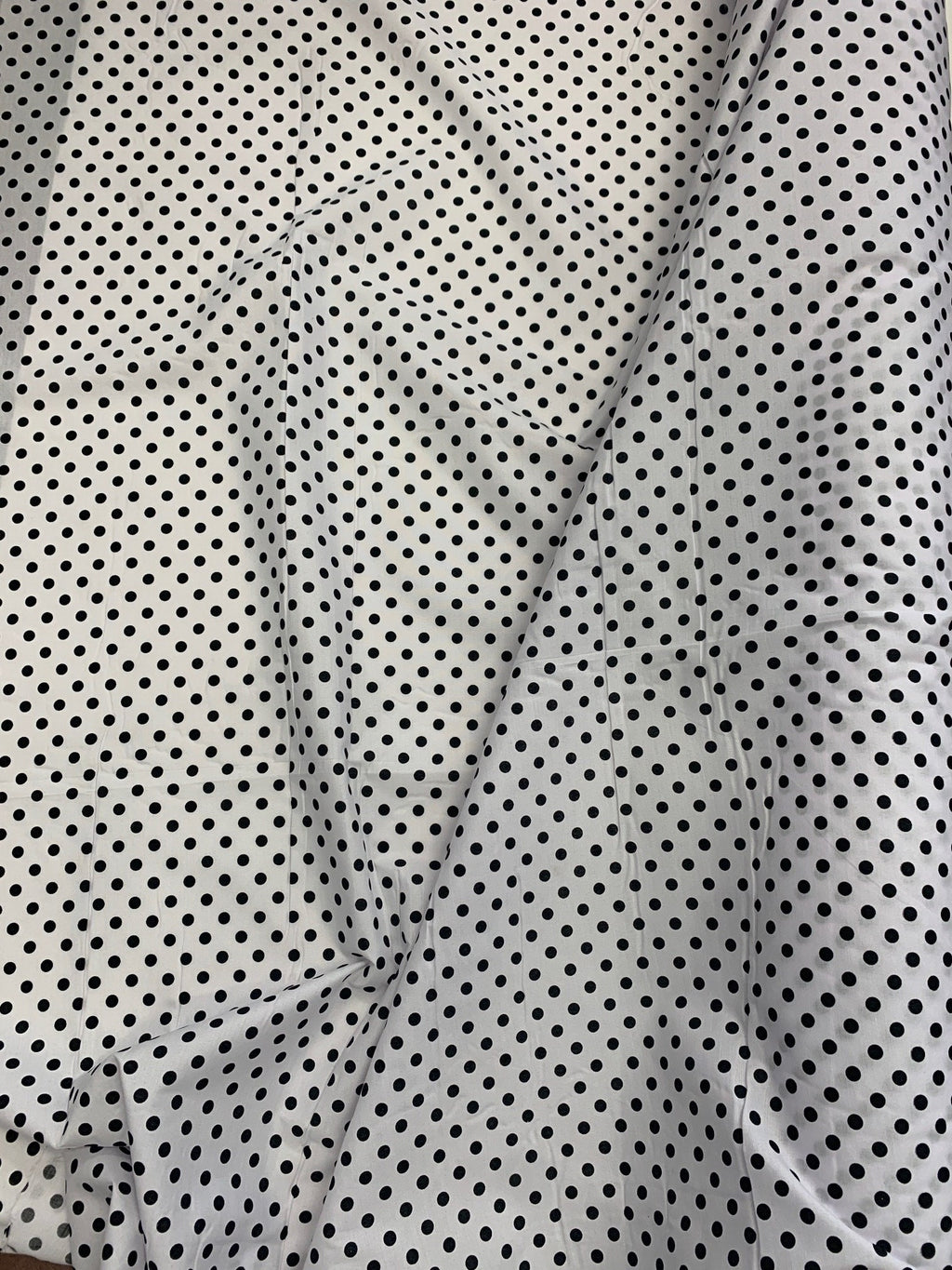 Polk dot fabric, width 57/58 inches, dot size is1/4 inch, 100% polyester broadcloth fabric, shirt weight. Available in 2 colors.