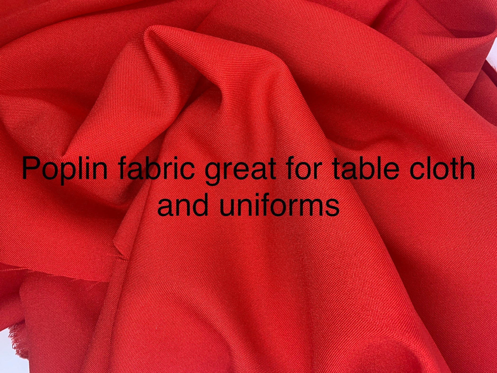 Red poplin fabric width 58/60 inches 100% polyester great for uniform and table cloth.sales by 1 yard increment.