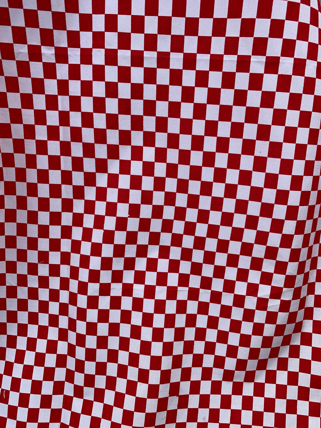 Small checker flag fabric, Broadcloth polyester fabric, shirt weight width 58 inches,1/2” inch square box. great uniform,table cloth, craft.