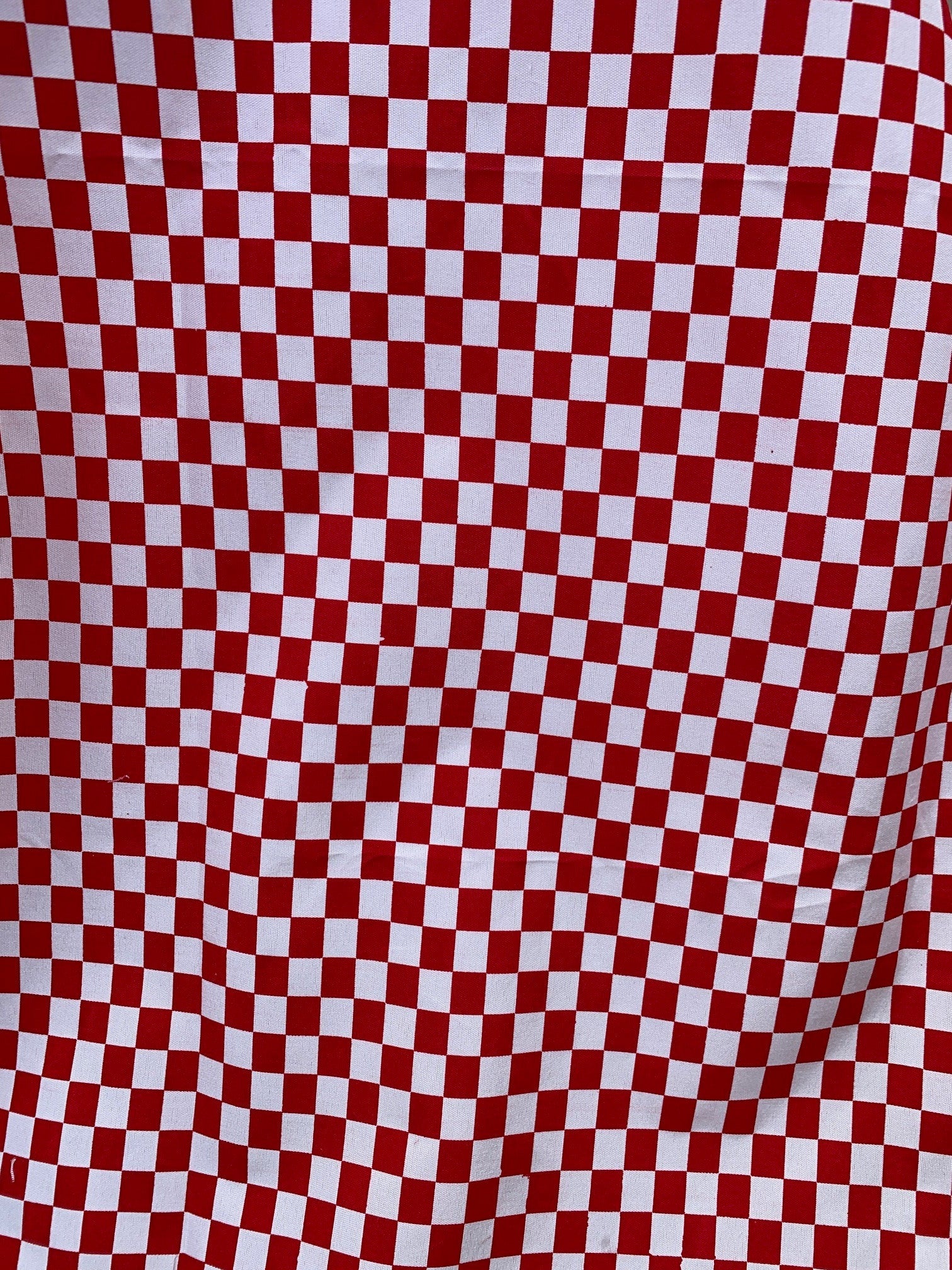 Small checker flag fabric, Broadcloth polyester fabric, shirt weight width 58 inches,1/2” inch square box. great uniform,table cloth, craft.