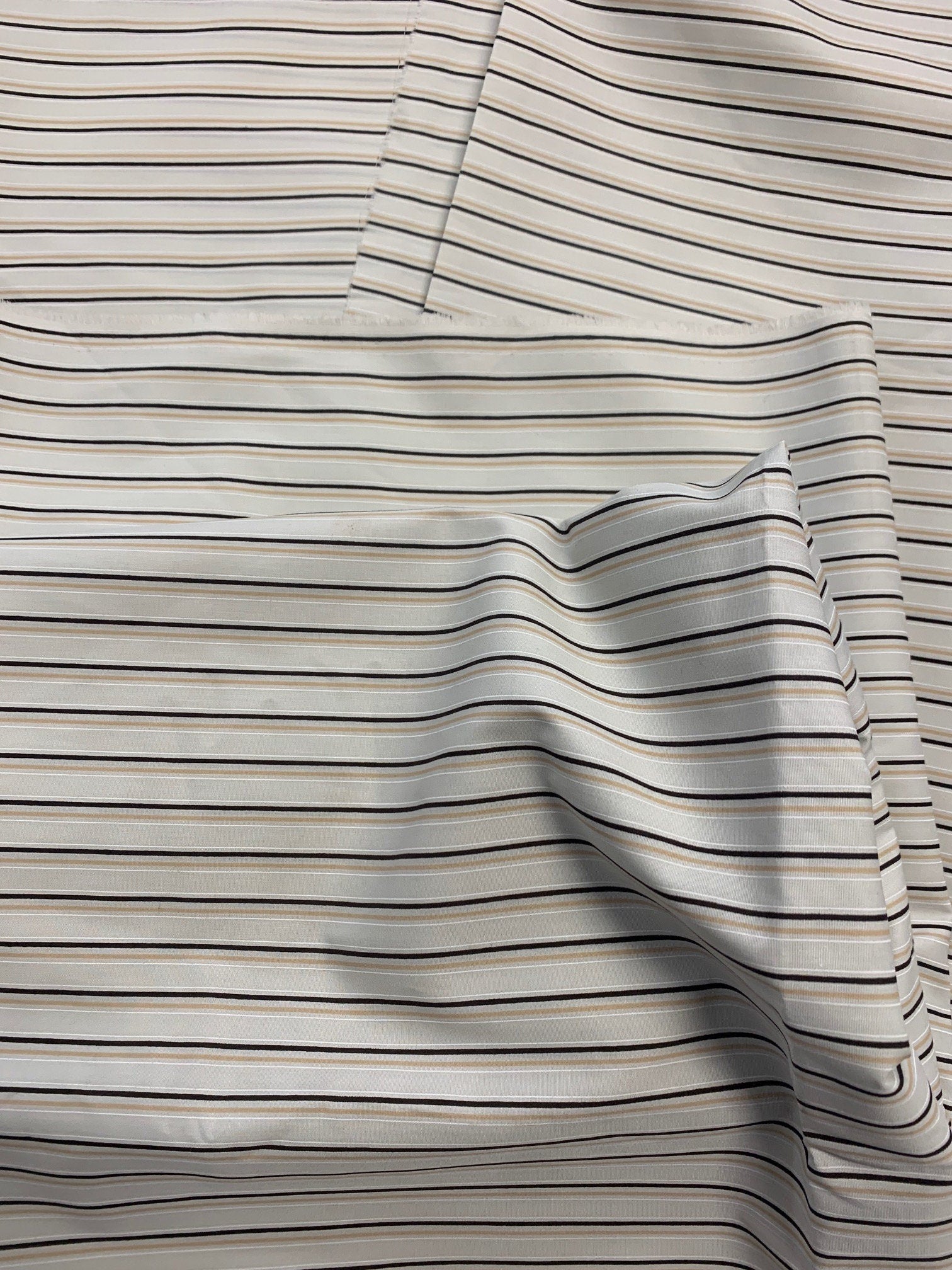 Stripes poly cotton wide 58/59" wide, great item for shirt, blouse or any tops. shirt weight, color Ivory stripes.