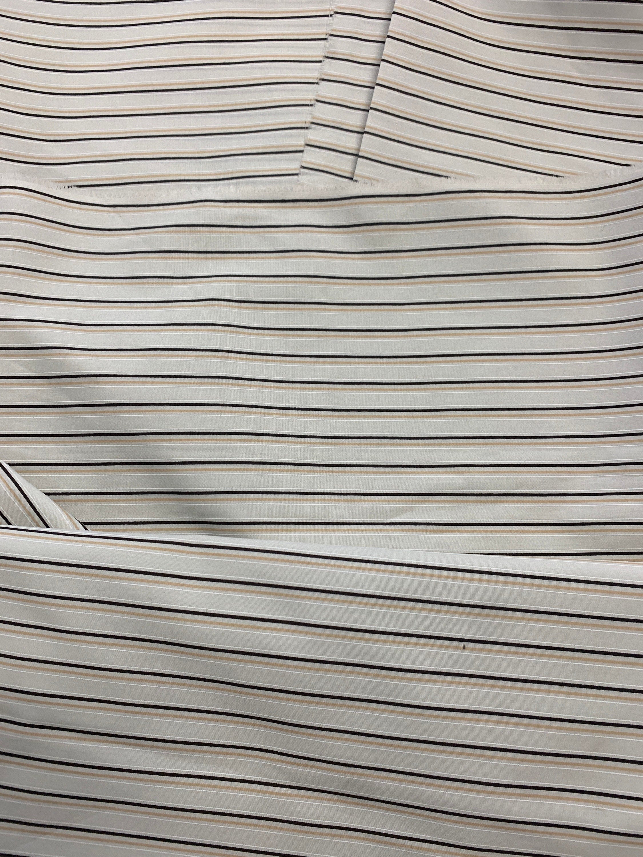 Stripes poly cotton wide 58/59" wide, great item for shirt, blouse or any tops. shirt weight, color Ivory stripes.