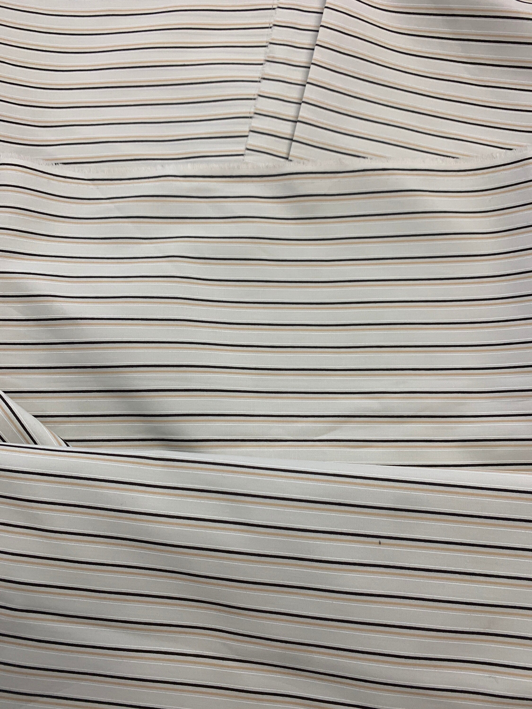 Stripes poly cotton wide 58/59" wide, great item for shirt, blouse or any tops. shirt weight, color Ivory stripes.