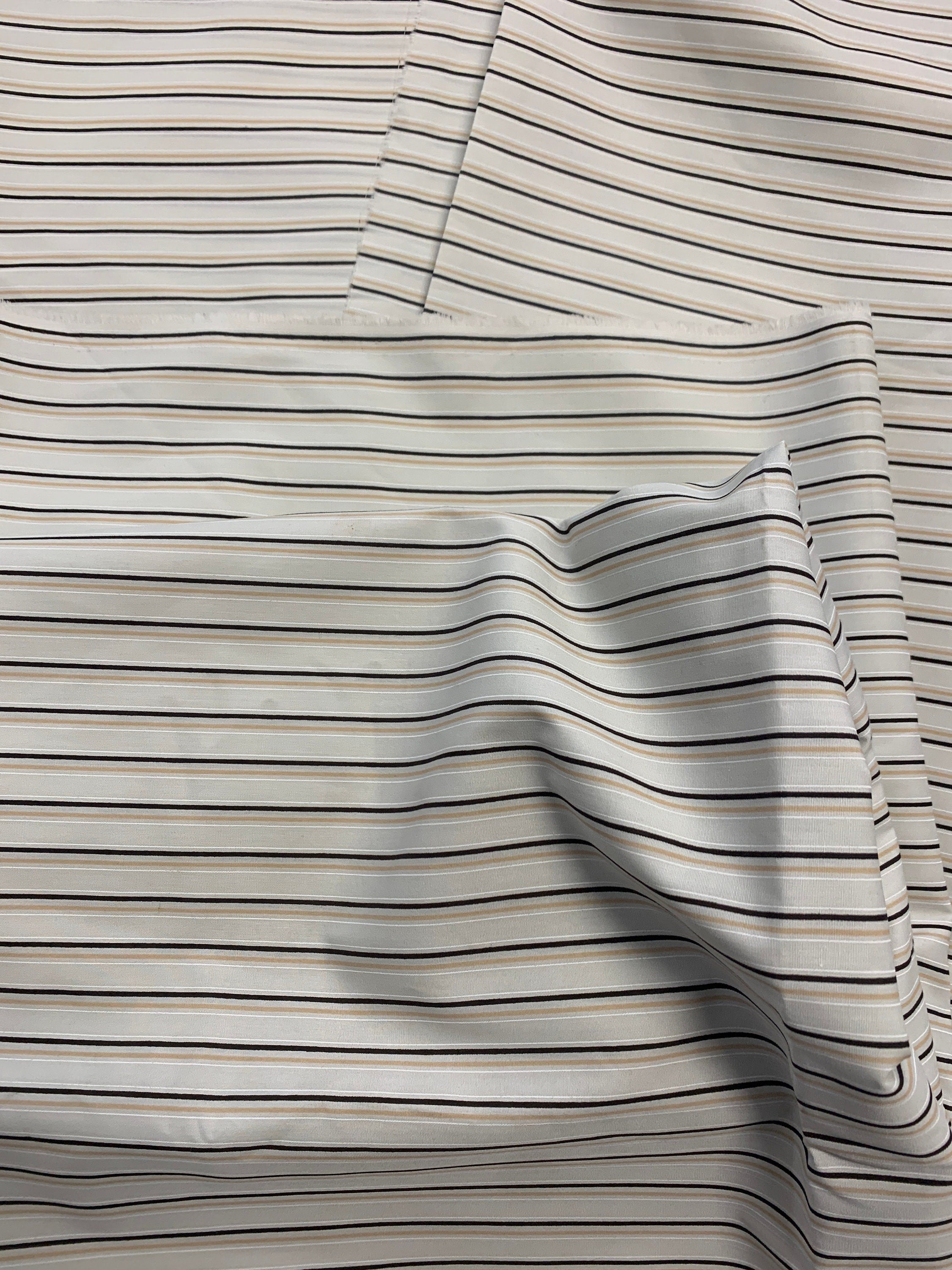 Stripes poly cotton wide 58/59" wide, great item for shirt, blouse or any tops. shirt weight, color Ivory stripes.