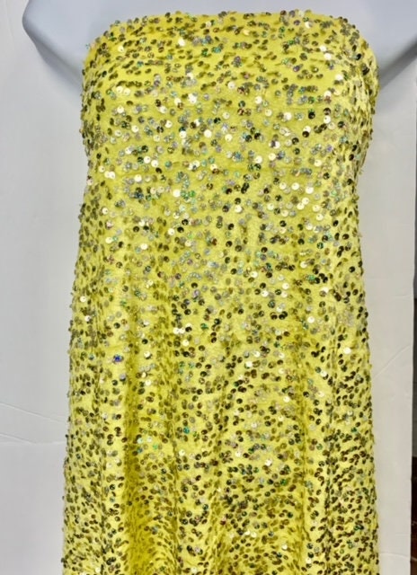 The Pane Velour with Sequins fabric. pane is a 58/60" wide textile made of 100% polyester. It features a soft texture with embedded sequins