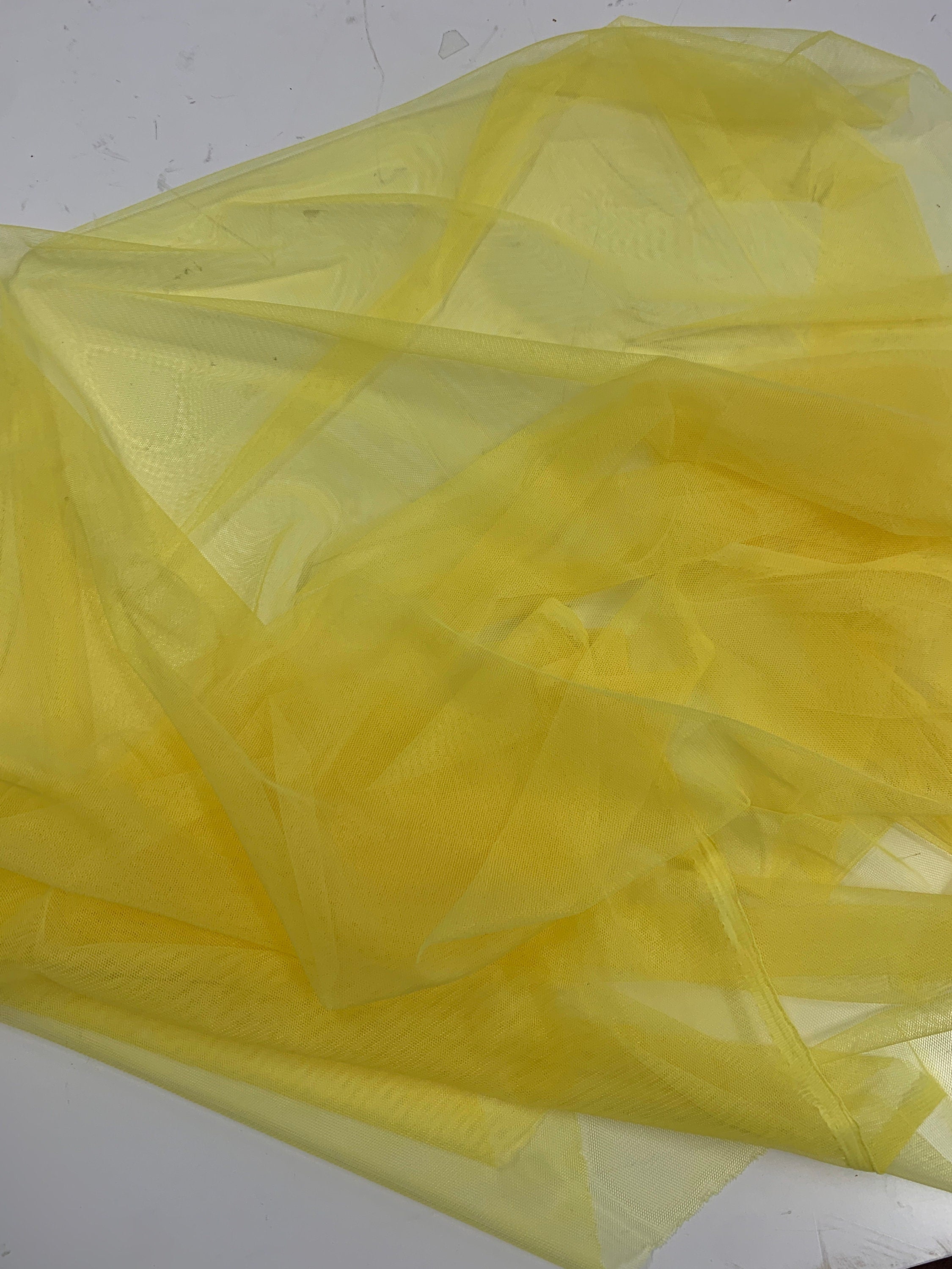 Yellow Mesh Fabric by yard. 100% polyester Mesh fabric width 55 inches.