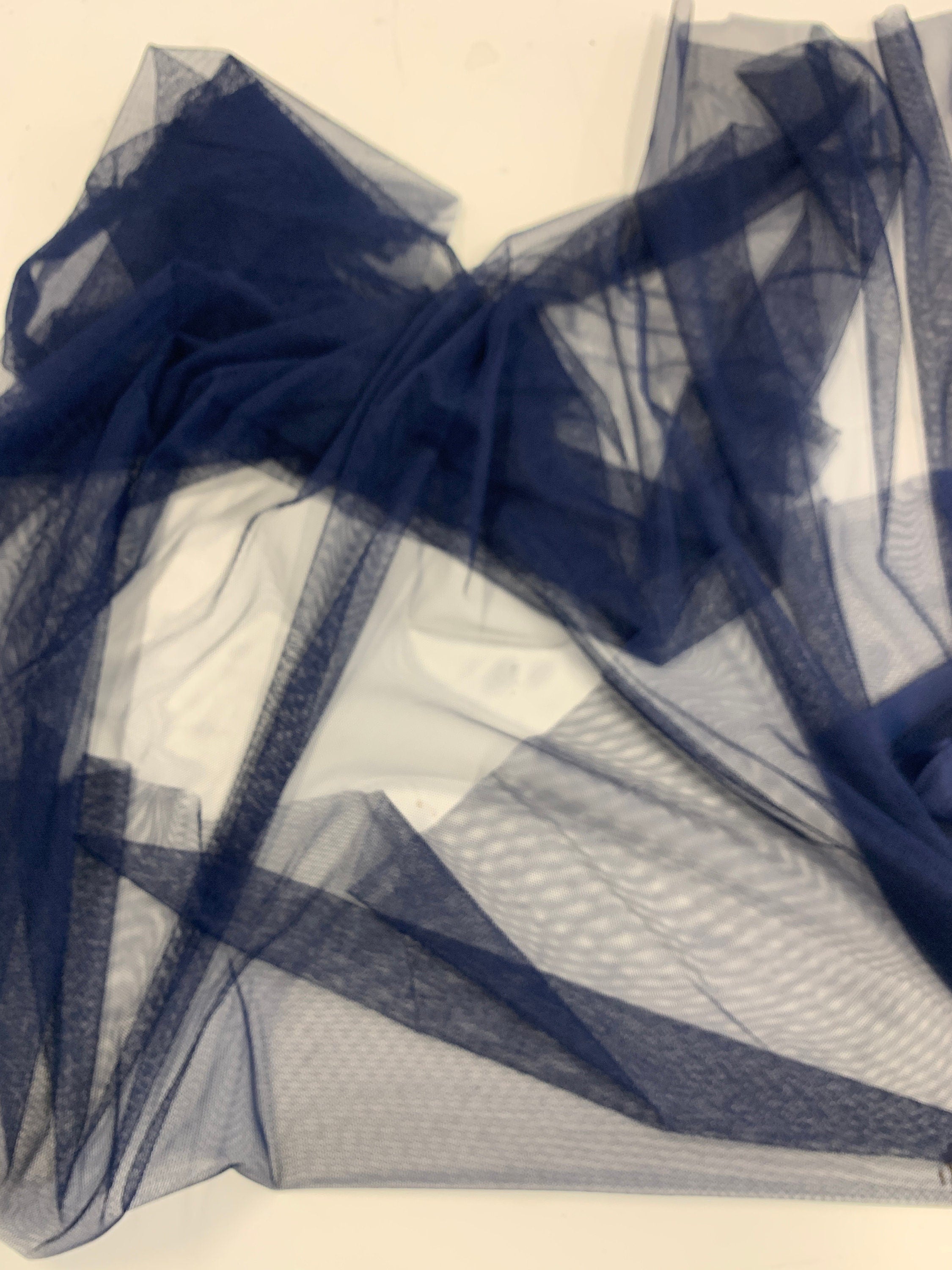 Navy Mesh Fabric by yard. 100% polyester Mesh fabric width 55 inches in Navy color.