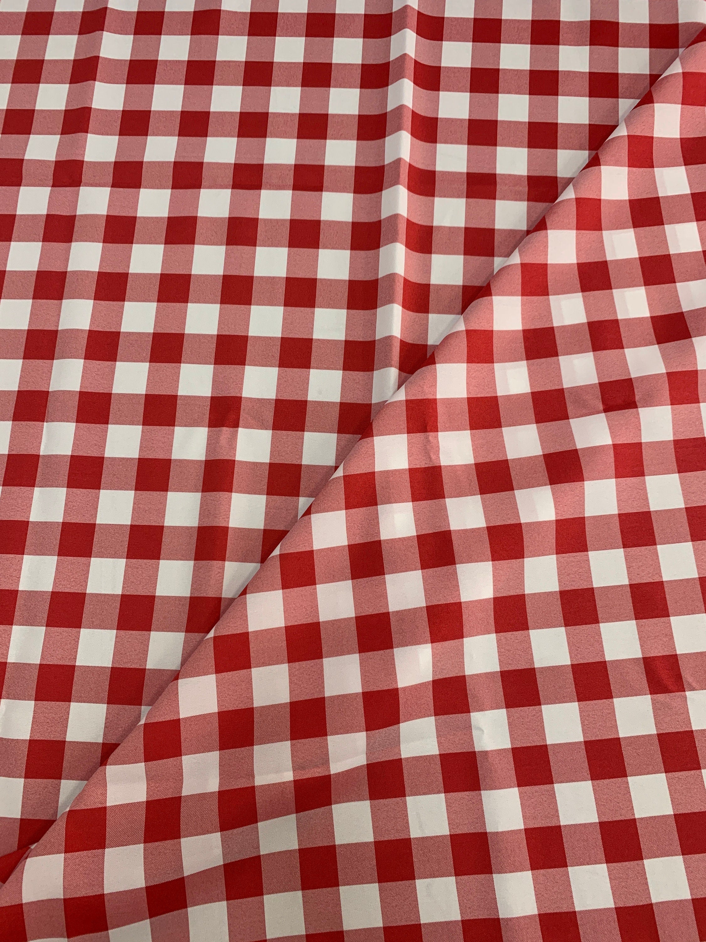 Red /White Poplin (checker) 1" inch squarePolyester fabric, great item for customs, decorations and more. 58 inches wide. sell by yard.