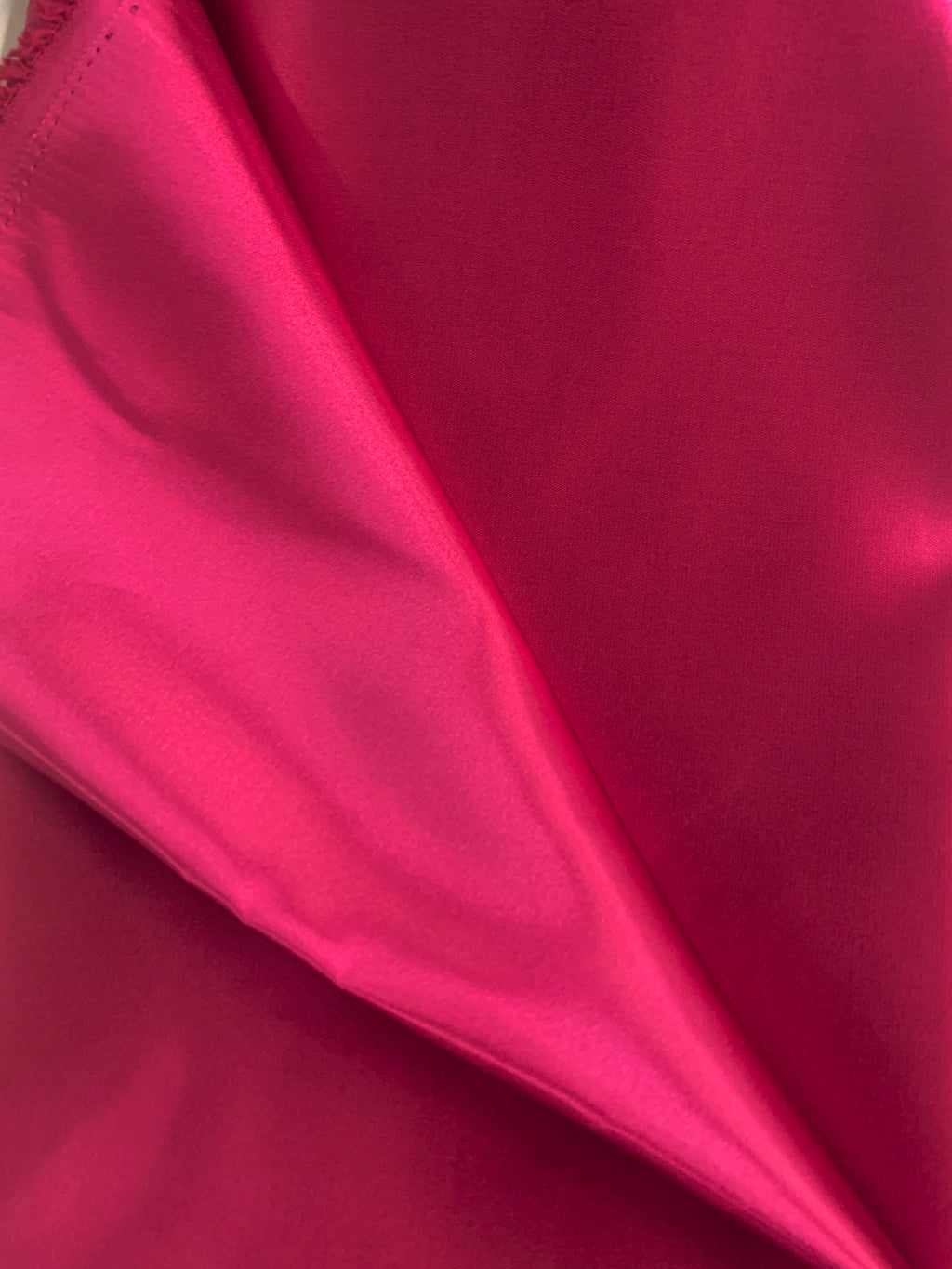Fucshia color Satin Fabric by yard. color fuchsia width 59 inches.