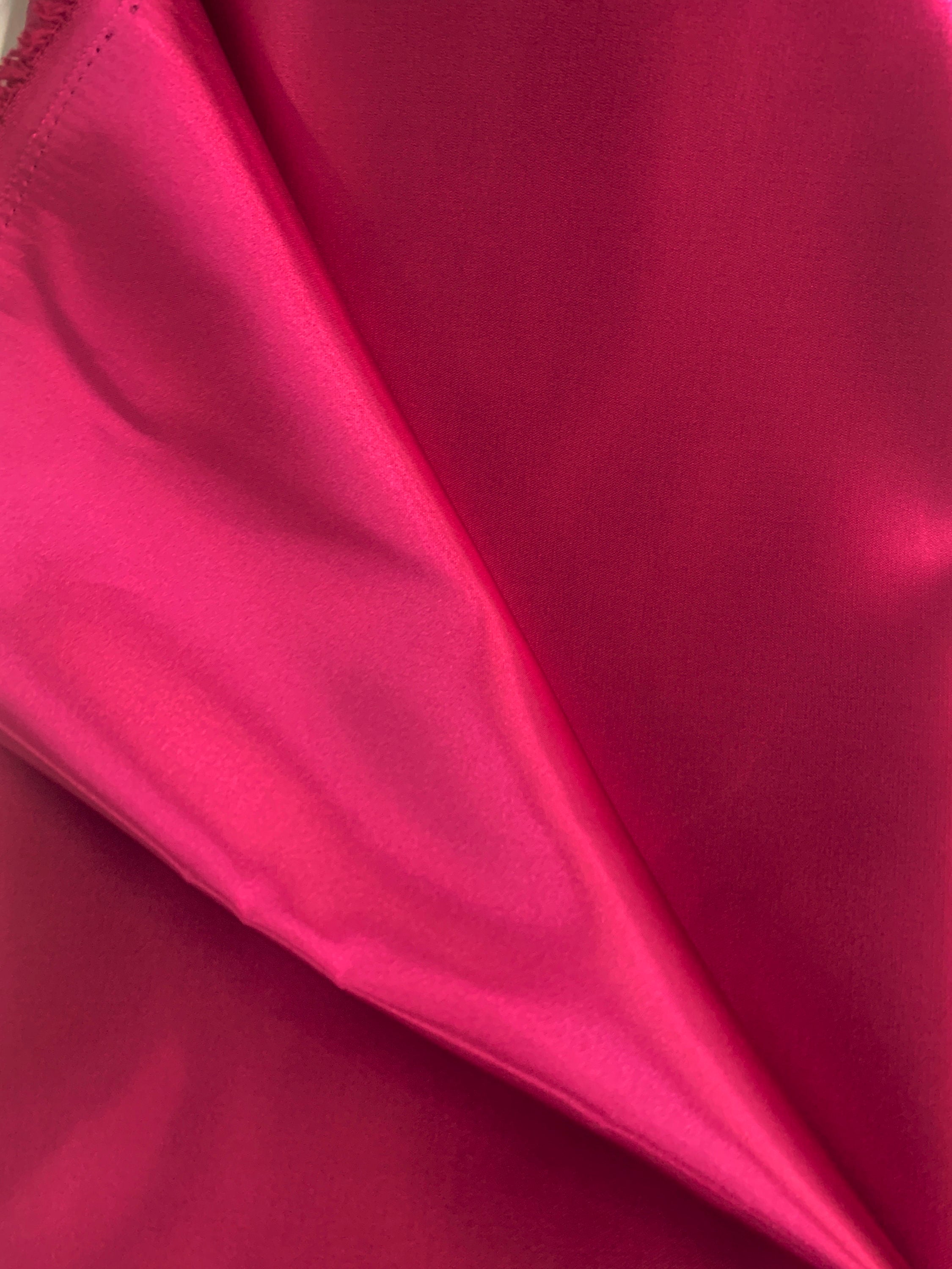 Fucshia color Satin Fabric by yard. color fuchsia width 59 inches.