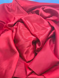 Red ruby satin 100% polyester, width 58/50". actual color bit lighter shade. free swatch available .