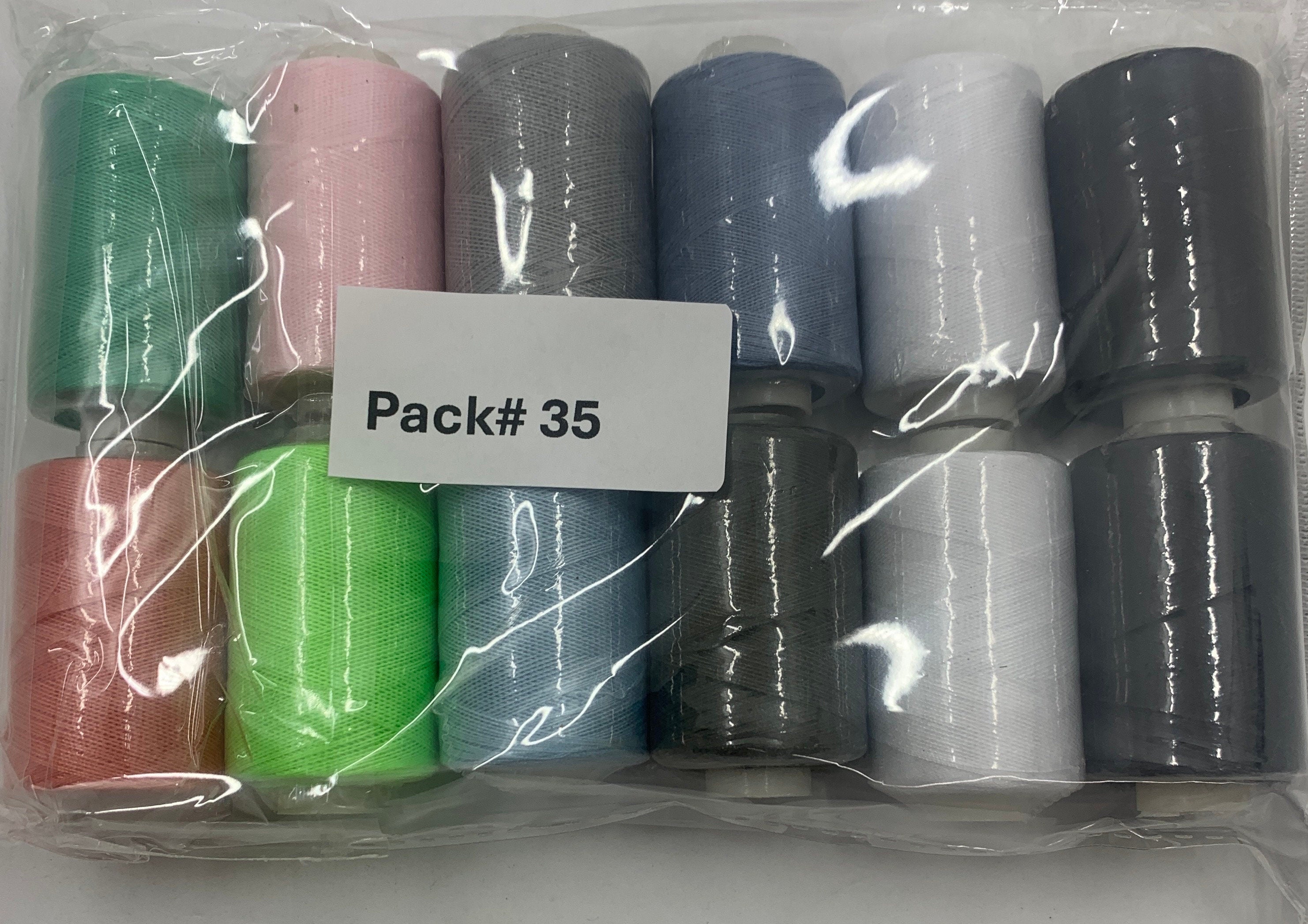 Sewing threads 12 assorted colors per package, each package assortment is different from each other, all packages has 2 black and 2 white.
