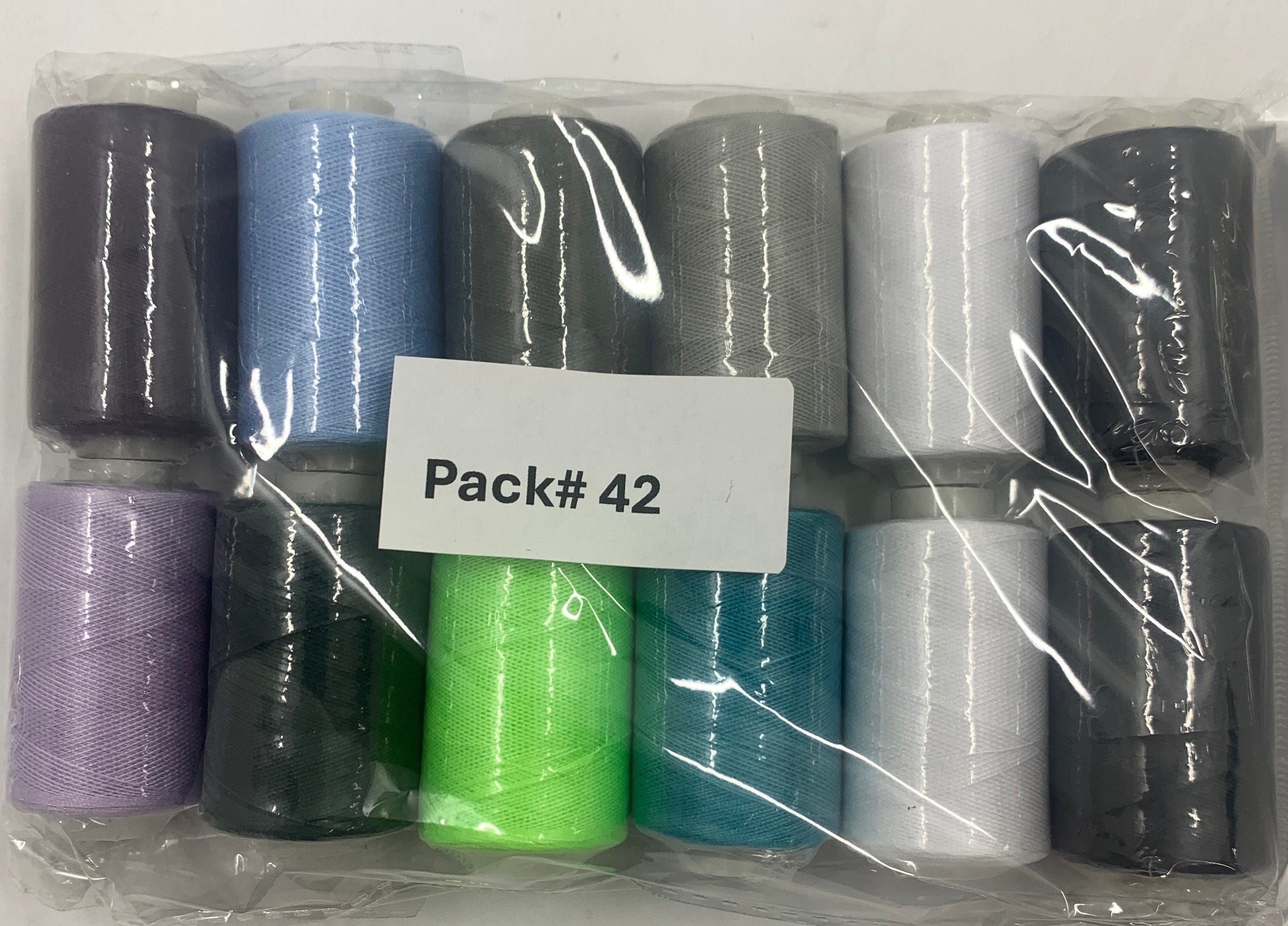 Sewing threads 12 assorted colors per package, each package assortment is different from each other, all packages has 2 black and 2 white.