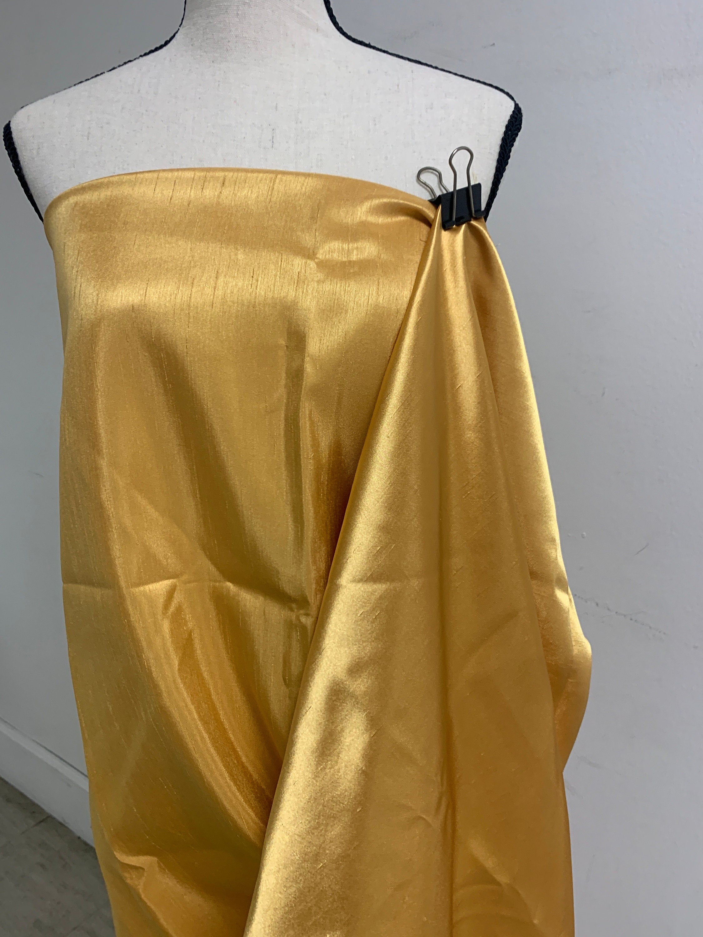 Antique Gold Slub Shantung Fabric width 58 inches polyester double sided dull and shiny.