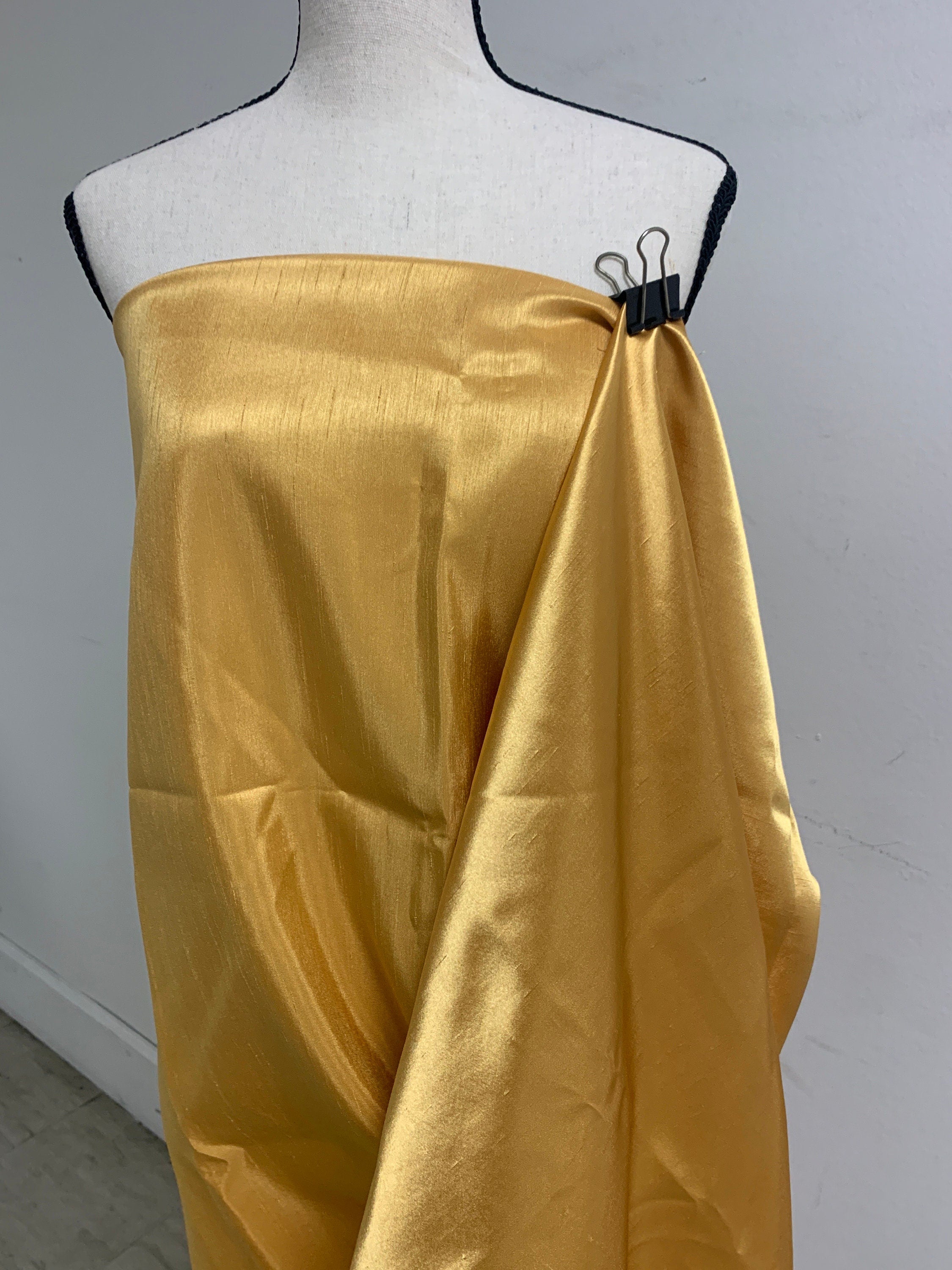 Antique Gold Slub Shantung Fabric width 58 inches polyester double sided dull and shiny.