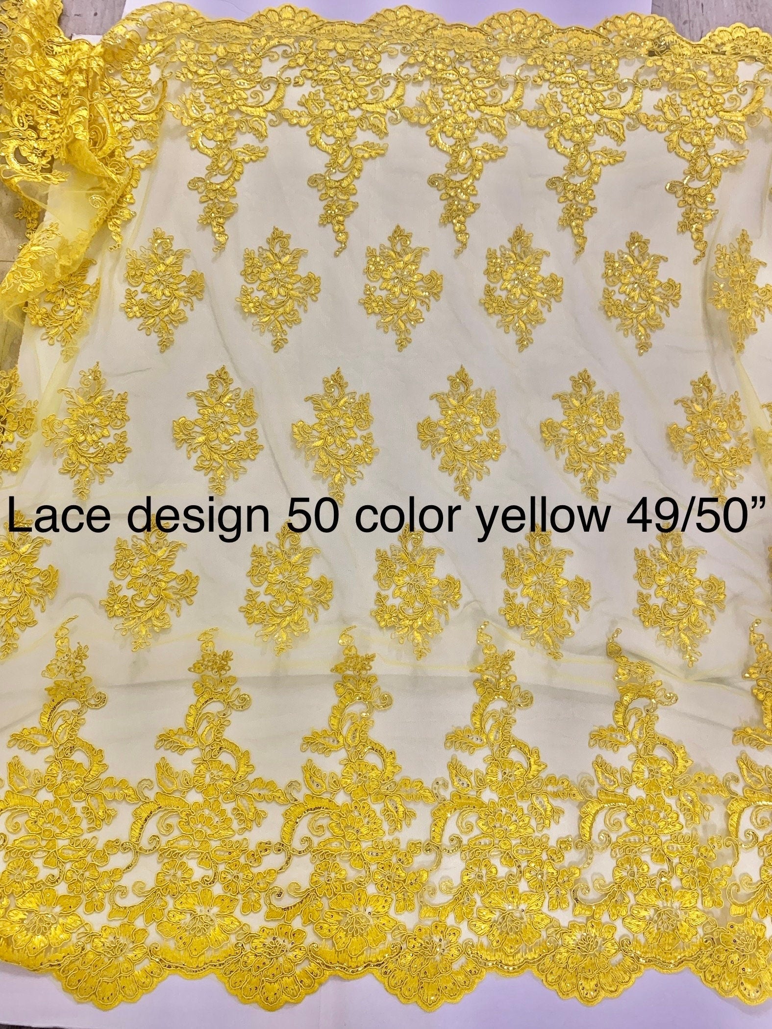 Yellow color Lace Design US50. Double scalloped sequence embroidered width 49/50 inches. condition New. sell by yard.