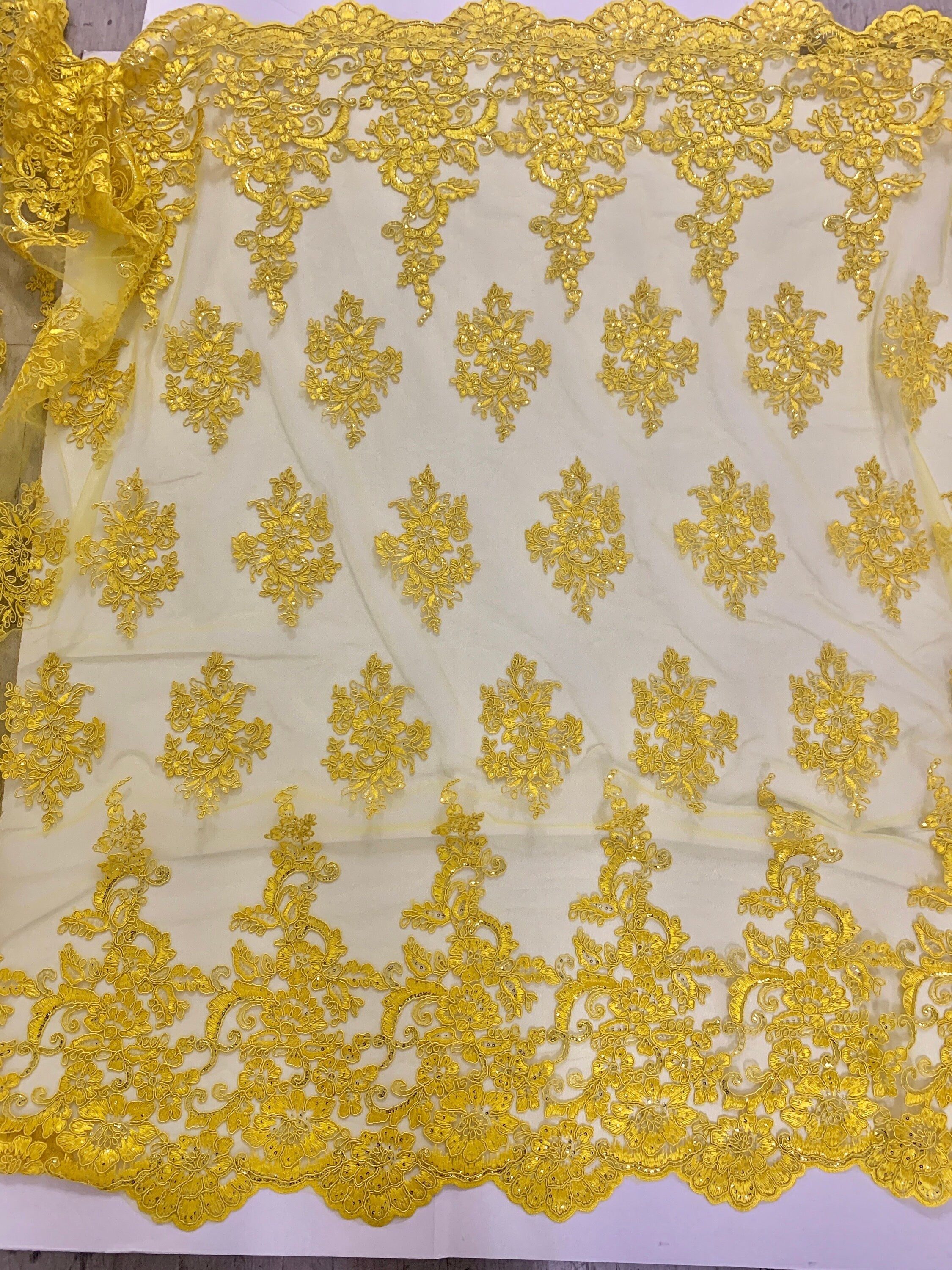 A 2 yard Yellow color Lace Design US50. Double scalloped sequence embroidered width 49/50 inches. condition New.