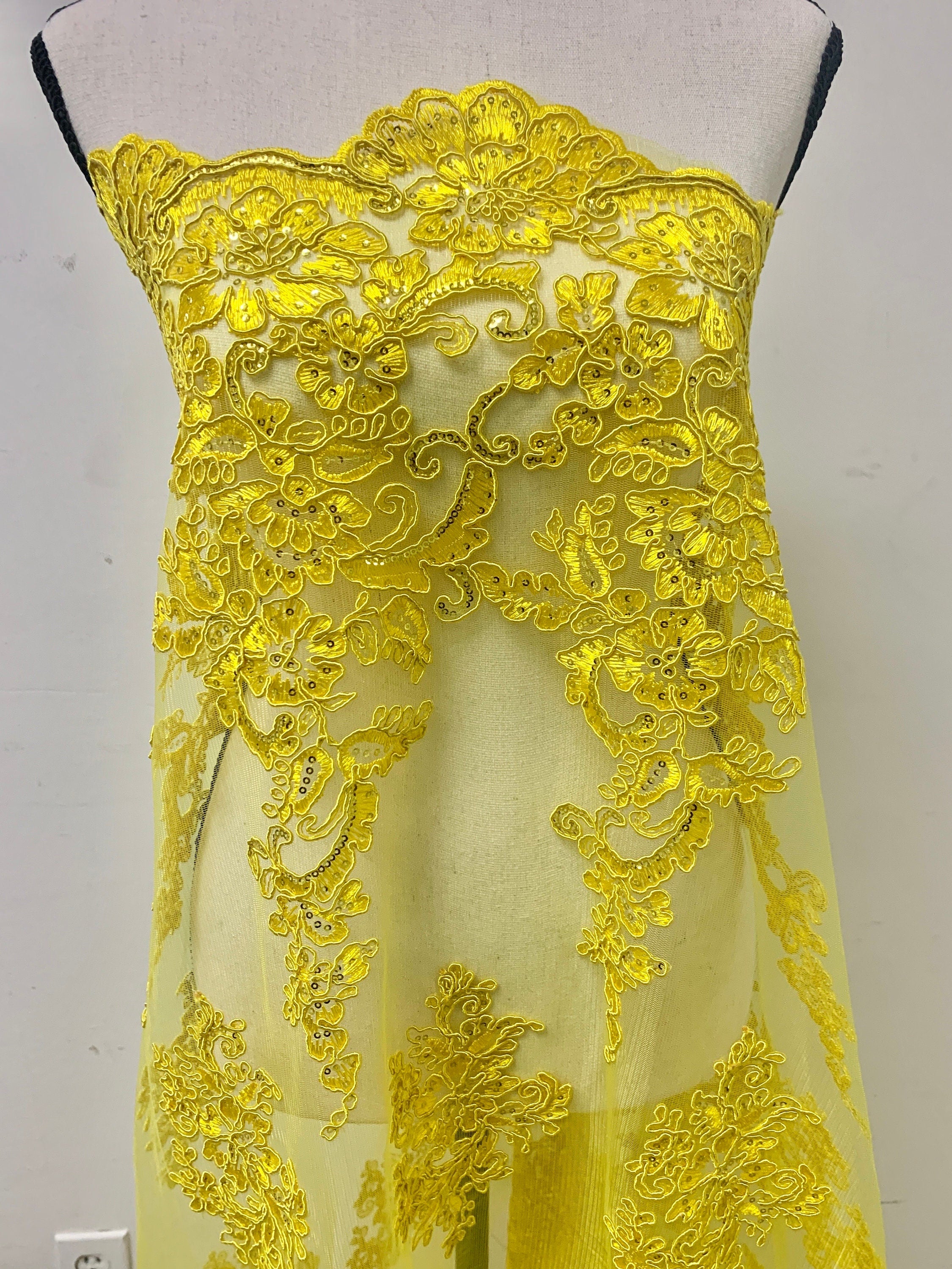 A 2 yard Yellow color Lace Design US50. Double scalloped sequence embroidered width 49/50 inches. condition New.