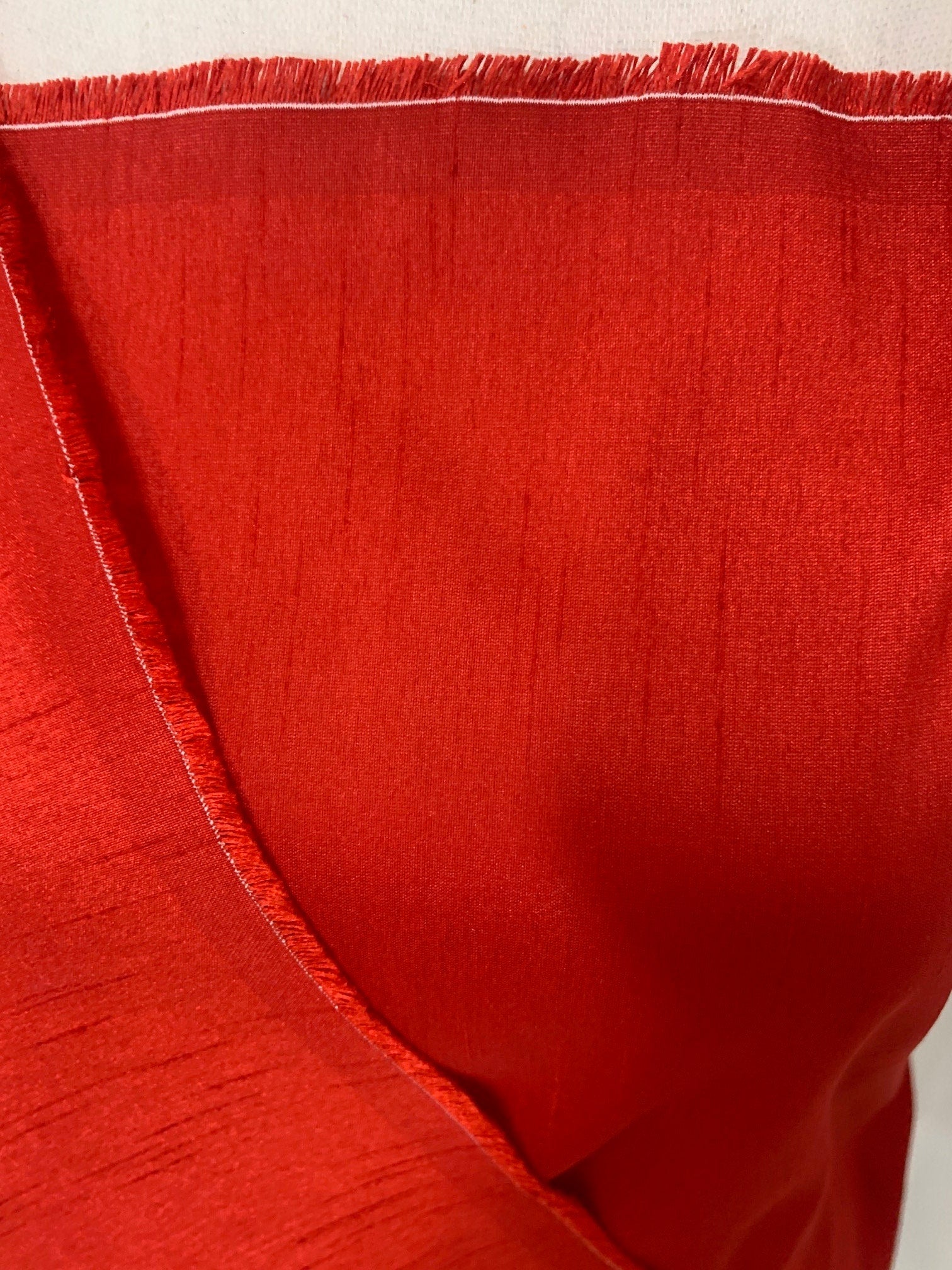 Red satin shantung fabric width 58" polyester, slubbed texture dull fininshed, dress, suiting and home decoration item. item 114
